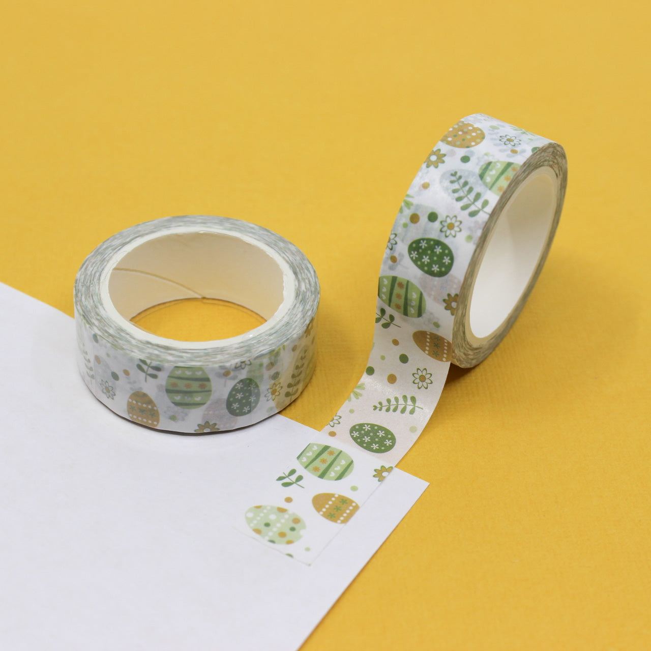 This delightful washi tape features a charming pattern of green and yellow Easter eggs, perfect for adding a festive touch to your Easter crafts and decorations. This tape is sold at BBB Supplies Craft Shop.