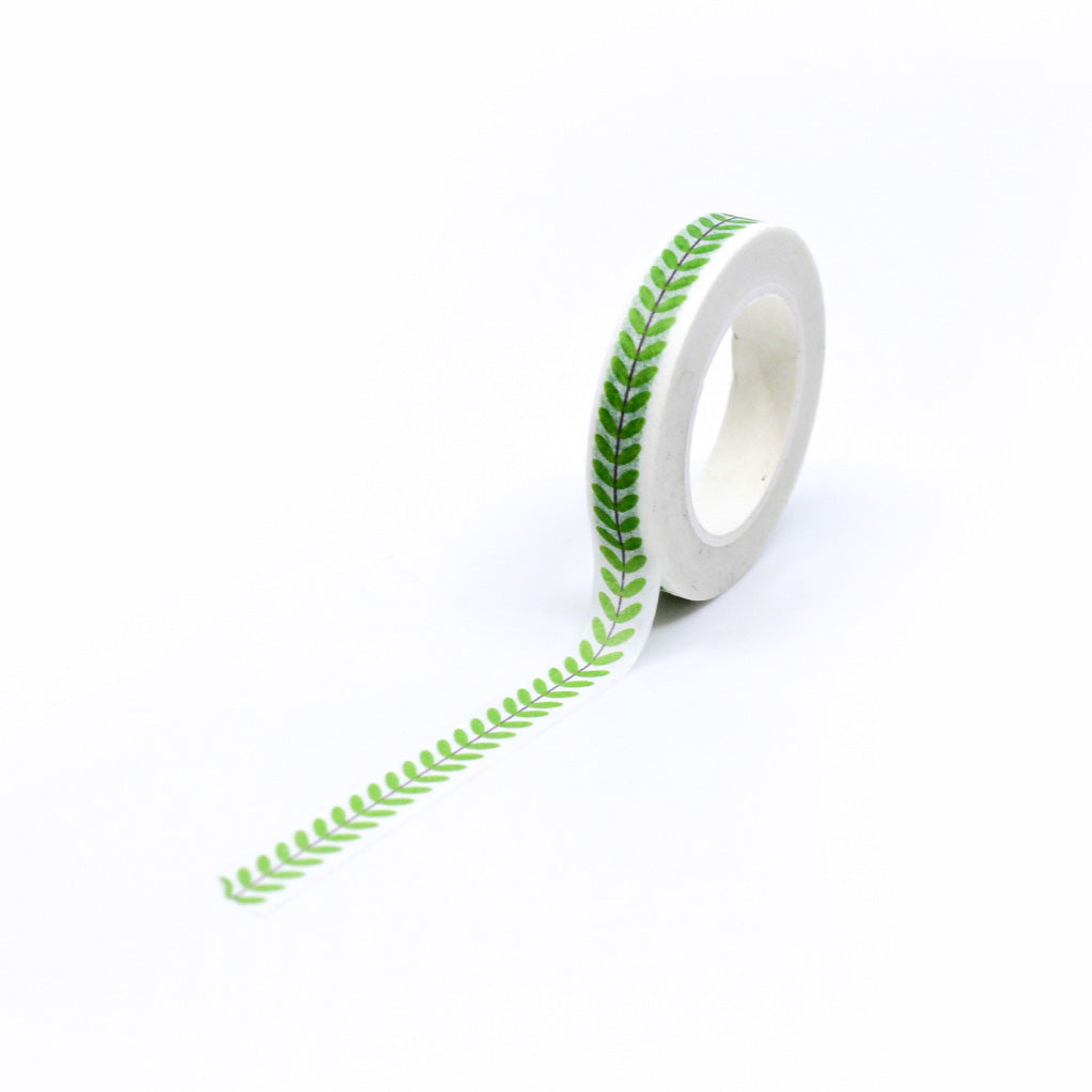 Embrace the beauty of nature with our Narrow Green Vine Washi Tape, featuring delicate vine and leaf patterns in a lush green hue. Ideal for adding a touch of botanical charm to your crafts.