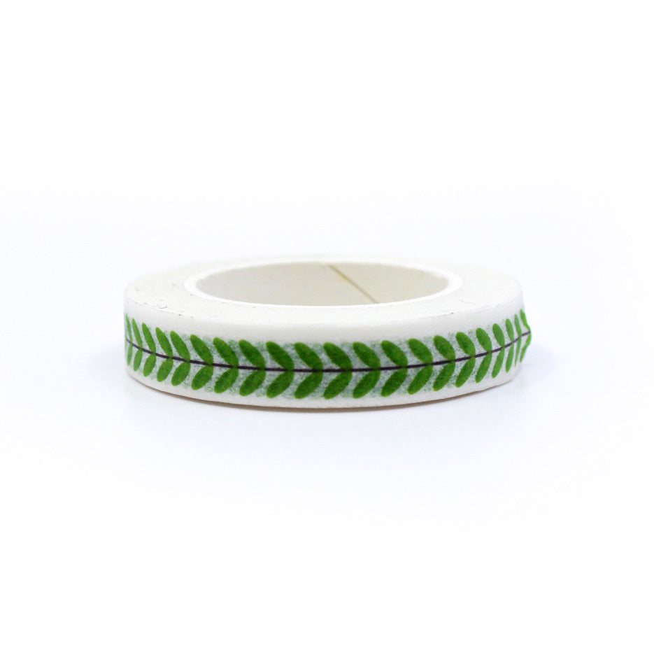 Embrace the beauty of nature with our Narrow Green Vine Washi Tape, featuring delicate vine and leaf patterns in a lush green hue. Ideal for adding a touch of botanical charm to your crafts.