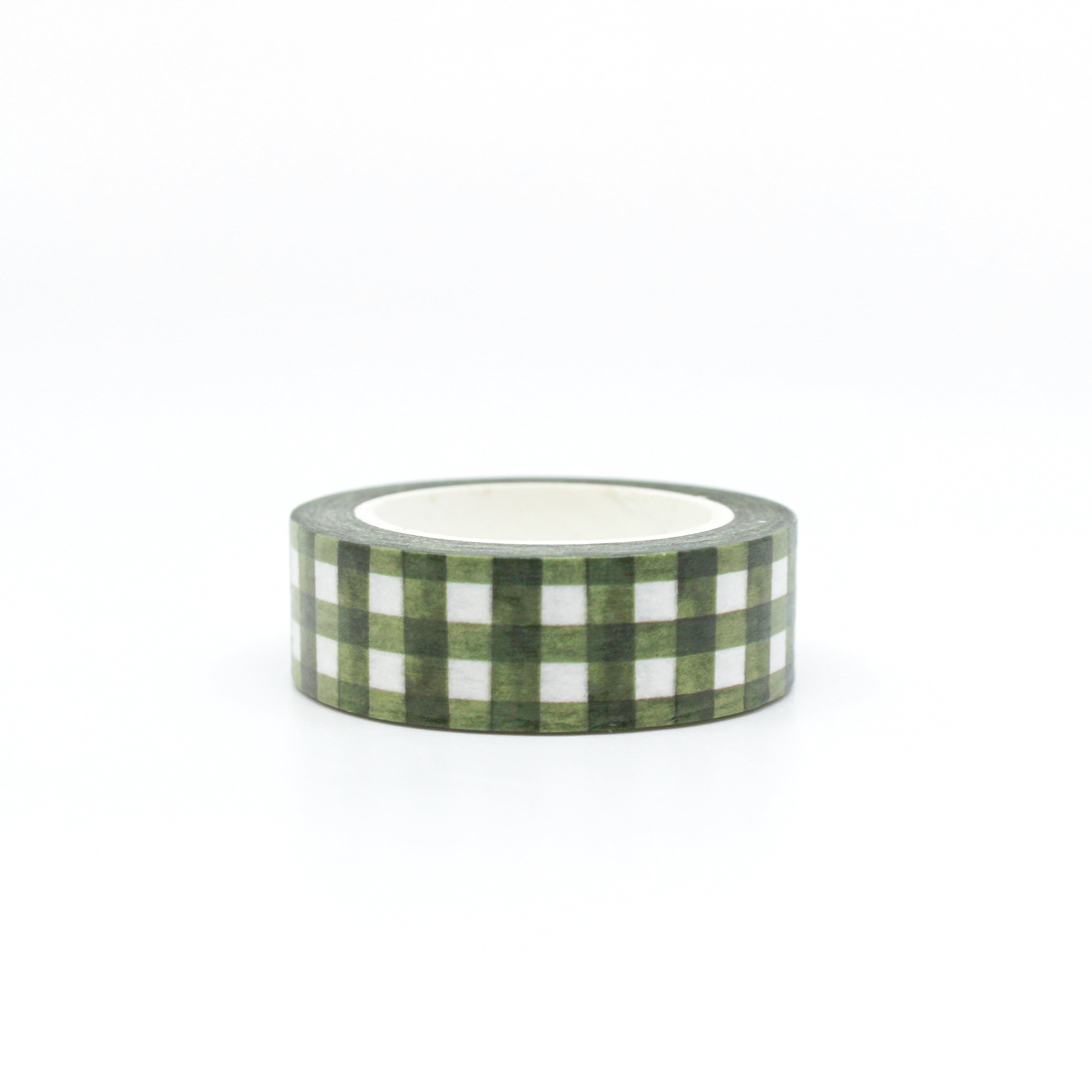 Green Spring Plaid Washi Tape: Add a touch of spring to your crafts with our Green Plaid Washi Tape. Featuring a fresh green color and classic plaid pattern, this tape is perfect for adding a cheerful accent to your projects. Ideal for scrapbooking, card making, journaling, and more, this versatile tape is a must-have for any crafter. This tape is sold at BBB Supplies Craft Shop.