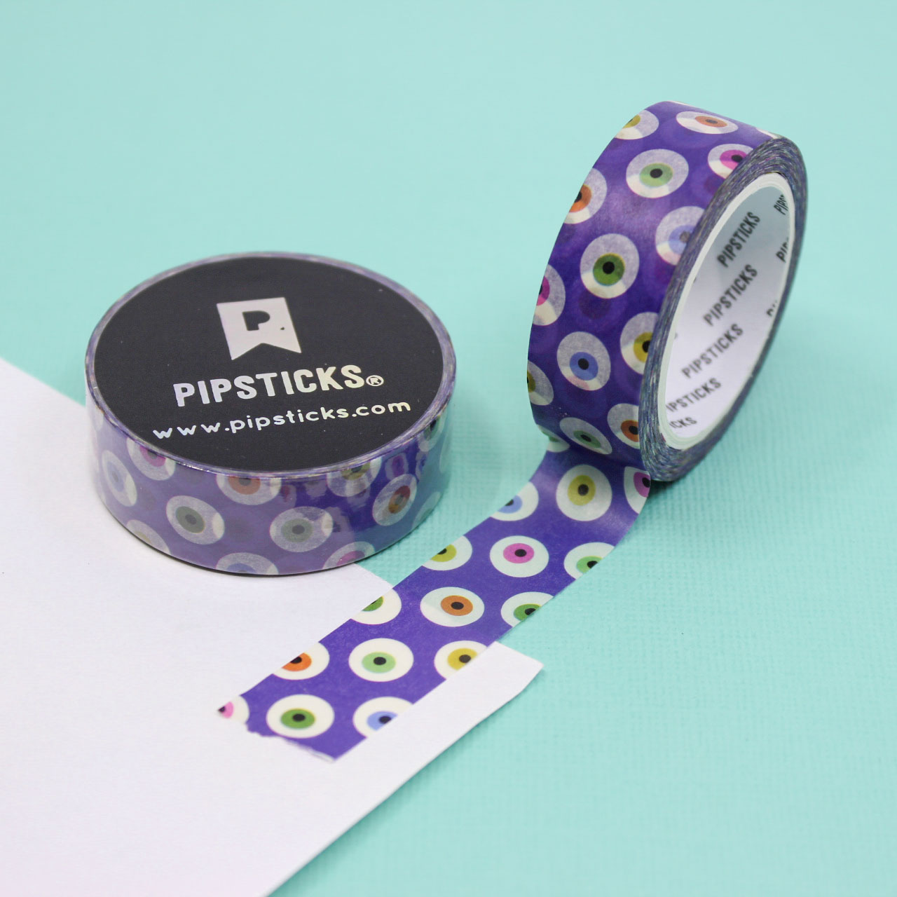 Purple Monster Eyes Washi Tape with quirky monster eyes on a bold purple background, perfect for Halloween crafts, planners, and spooky-themed projects.