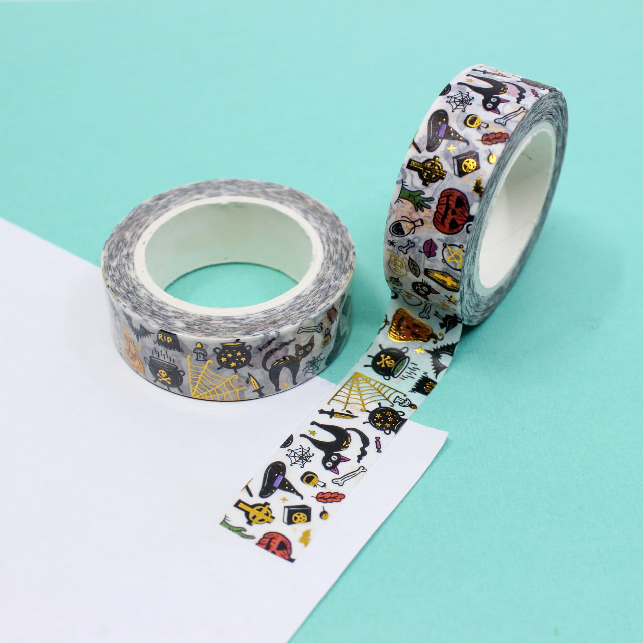 Elevate your Halloween crafts with our Gold Foil Halloween Objects Washi Tape, featuring a collection of spooky and stylish Halloween-themed illustrations in shimmering gold foil. Ideal for adding an elegant and festive touch to your projects. This tape is sold at BBB Supplies Craft Shop.