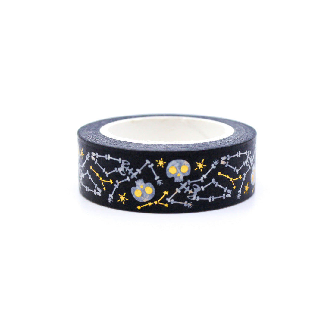 Embrace the macabre with our Gold Foil Skull and Bones Washi Tape, featuring a stylish pattern of skulls and bones in shimmering gold foil. Ideal for adding a touch of elegance to your spooky projects. This tape is sold at BBB Supplies craft Shop.