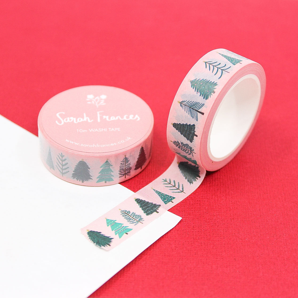 Minimalist holiday washi with Christmas tree pattern on pink background