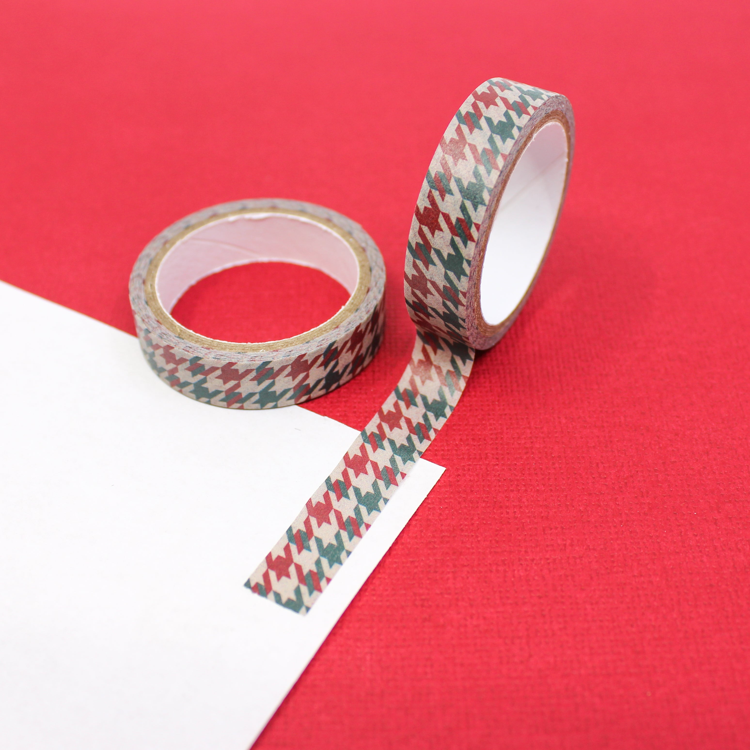 Infuse your creations with the elegance of the season using our washi tape adorned with Christmas houndstooth patterns, capturing the sophistication and charm of holiday fashion. This tape is sold at BBB Supplies Craft Shop.