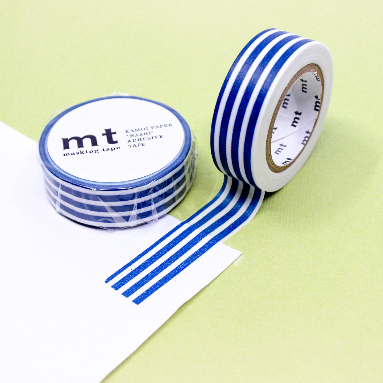 Enhance your crafts with our thicker line horizontal stripe washi tape, featuring bold and stylish stripes in a variety of colors, perfect for adding a dynamic and vibrant element to your projects. This Indigo Navy Blue Stripe tape is from MT Brand Masking Tape and sold at BBB Supplies Craft Shop.