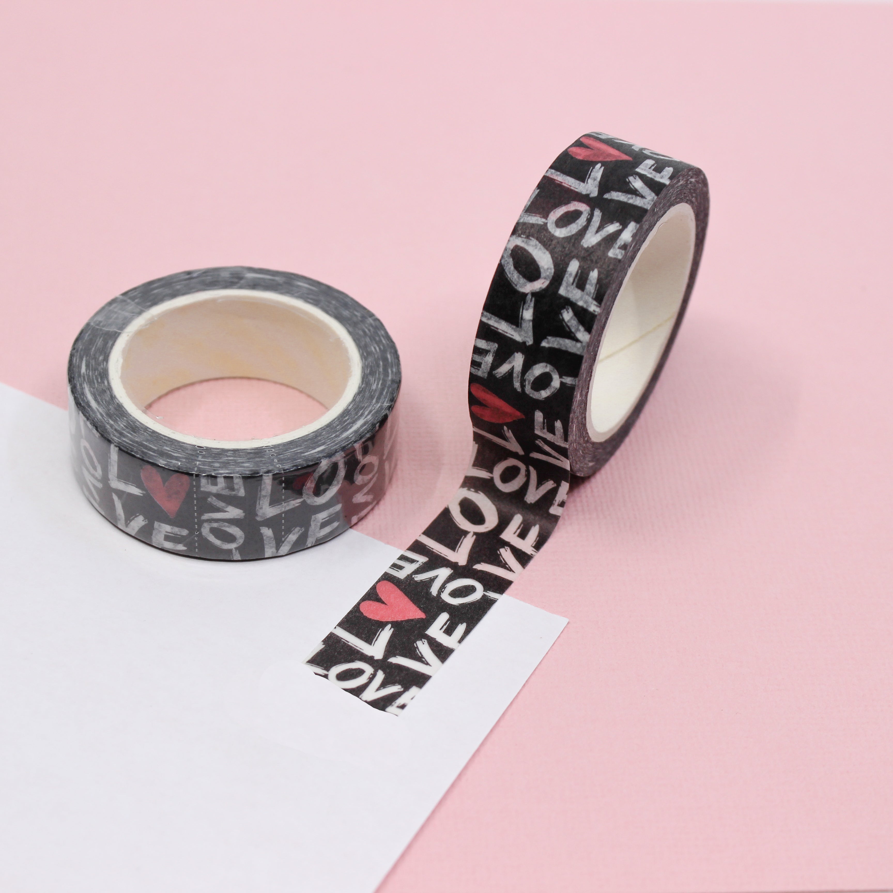 Elevate your crafts with this fun and graphic Love Typography Washi Tape. This tape uses a modern graffiti-style font to spell out expressions of love with heart motifs and is sold at BBB Supplies Craft Shop.