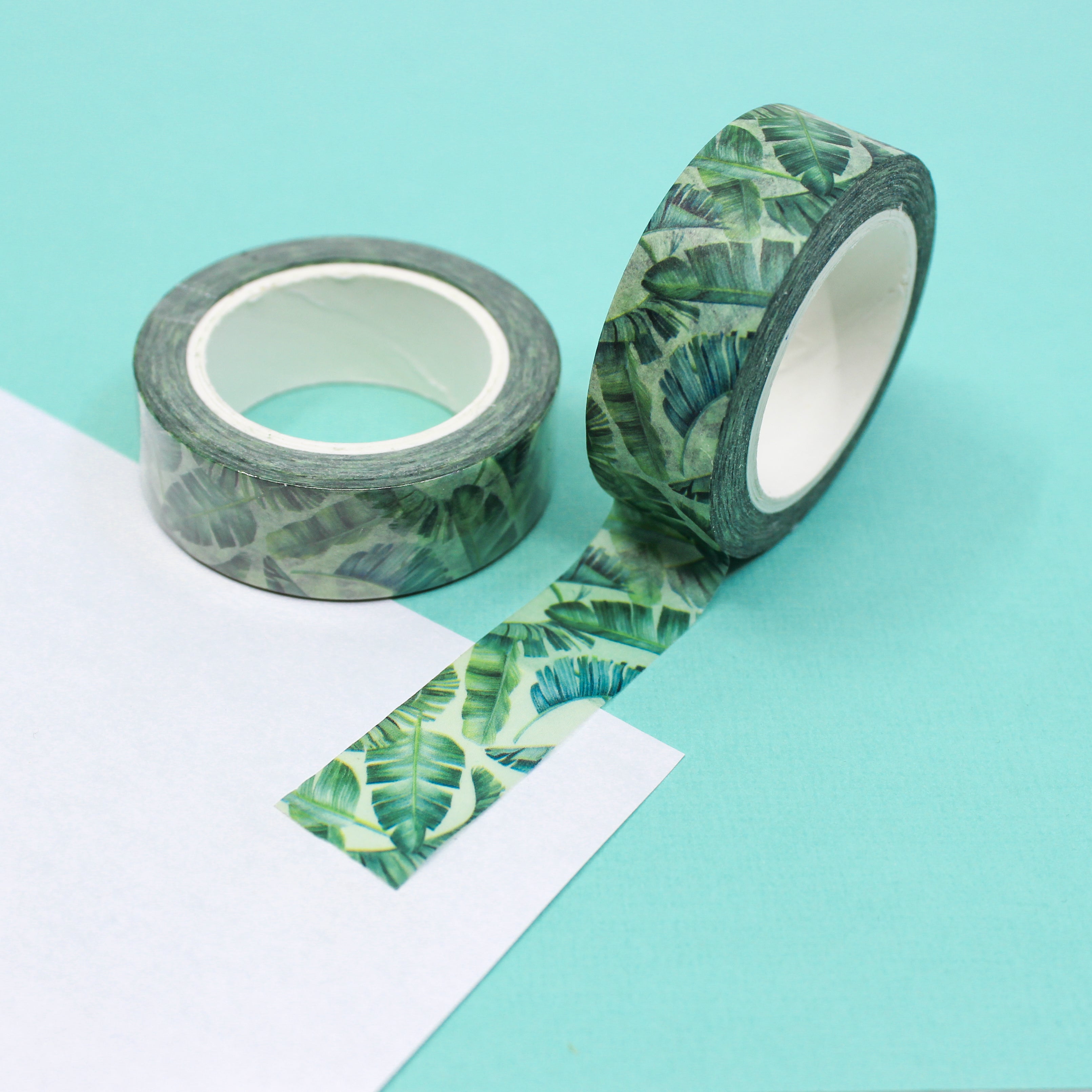 Transport yourself to a tropical paradise with our vibrant banana leaf washi tape, featuring lush green foliage for a touch of exotic beauty. Infuse your projects with a tropical flair using our stunning banana leaf washi tape, adorned with rich green foliage that exudes a sense of lushness and serenity. This tape is sold at BBB Supplies Craft Shop.