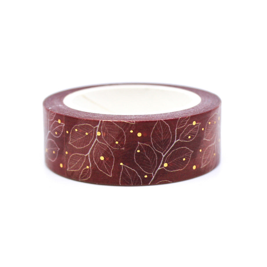 Add a touch of elegance to your projects with this exquisite washi tape. Featuring a rich maroon color with intricate gold foil leaf motifs, this tape is perfect for adding a luxurious accent to your crafts. This tape is sold at BBB Supplies Craft Shop.