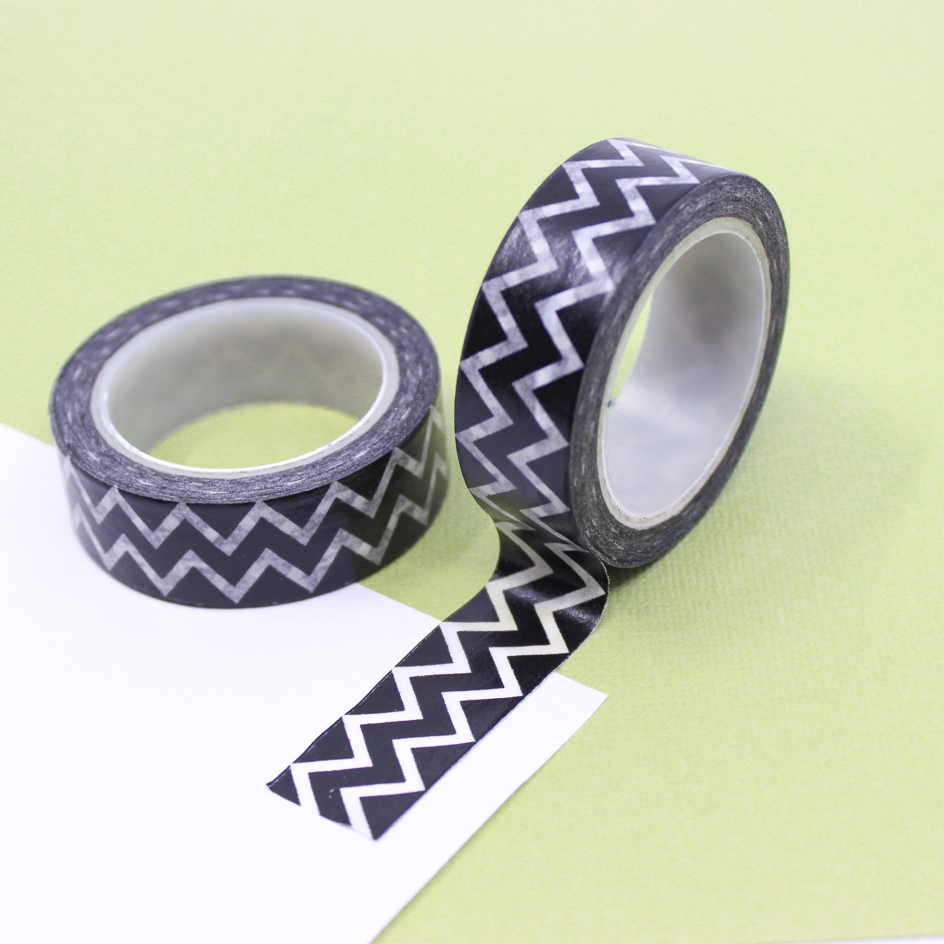 Elevate your creations with our captivating black and white chevron tape, showcasing a bold chevron design in classic black and white, creating a modern and energetic element for your projects. This tape is sold at BBB Supplies Craft Shop.