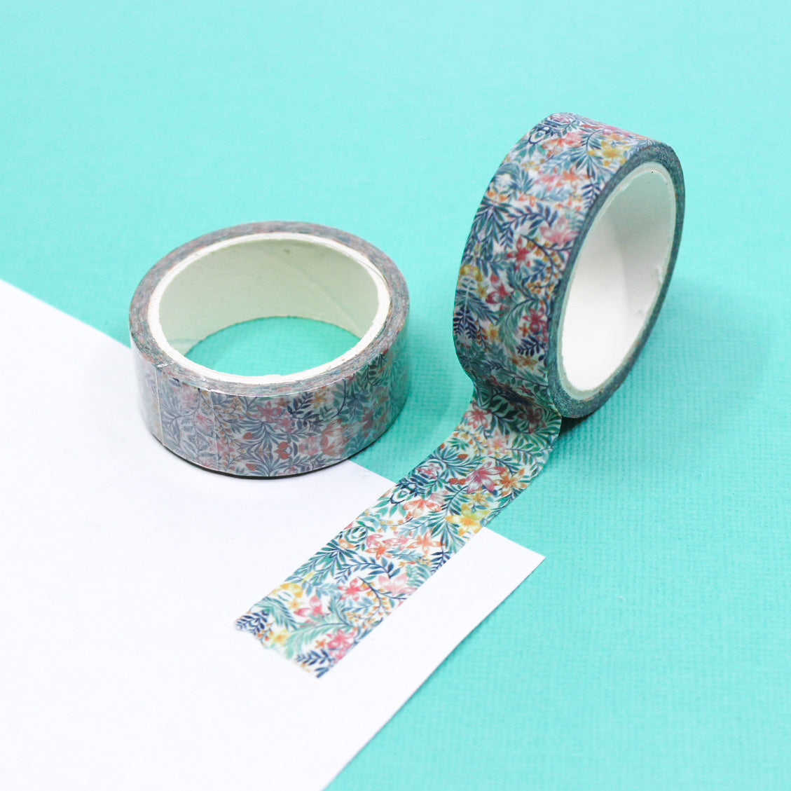 A vibrant washi tape featuring contemporary tropical leaf and floral designs, perfect for adding a fresh, exotic flair to your planners, journals, and crafting projects. This tape is sold at BBB Supplies Craft Shop.