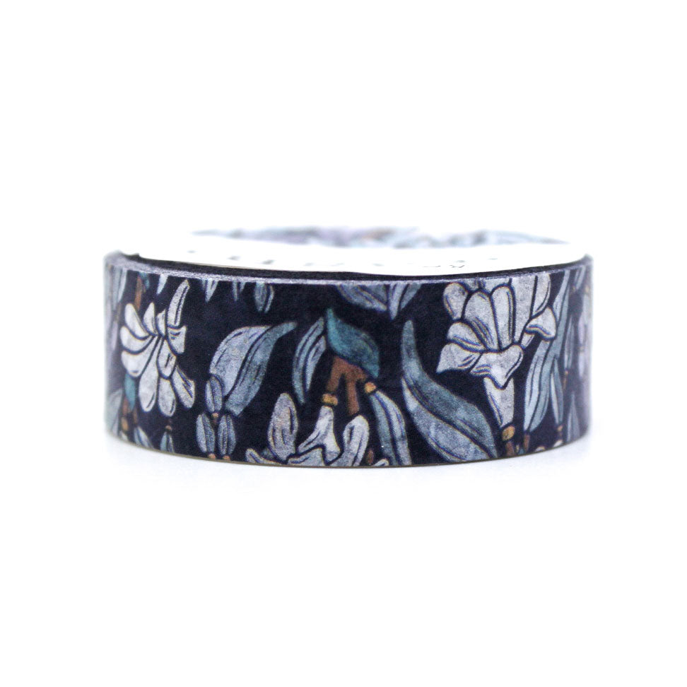 This blue Moonlight Tuberose Floral Washi Tape brings a dreamy, serene vibe to your crafts with its delicate depiction of tuberose blooms under a soft blue moonlit sky. The intricate floral design paired with deep blue hues evokes a sense of calm and elegance, making it perfect for enhancing journals, planners, or DIY projects.