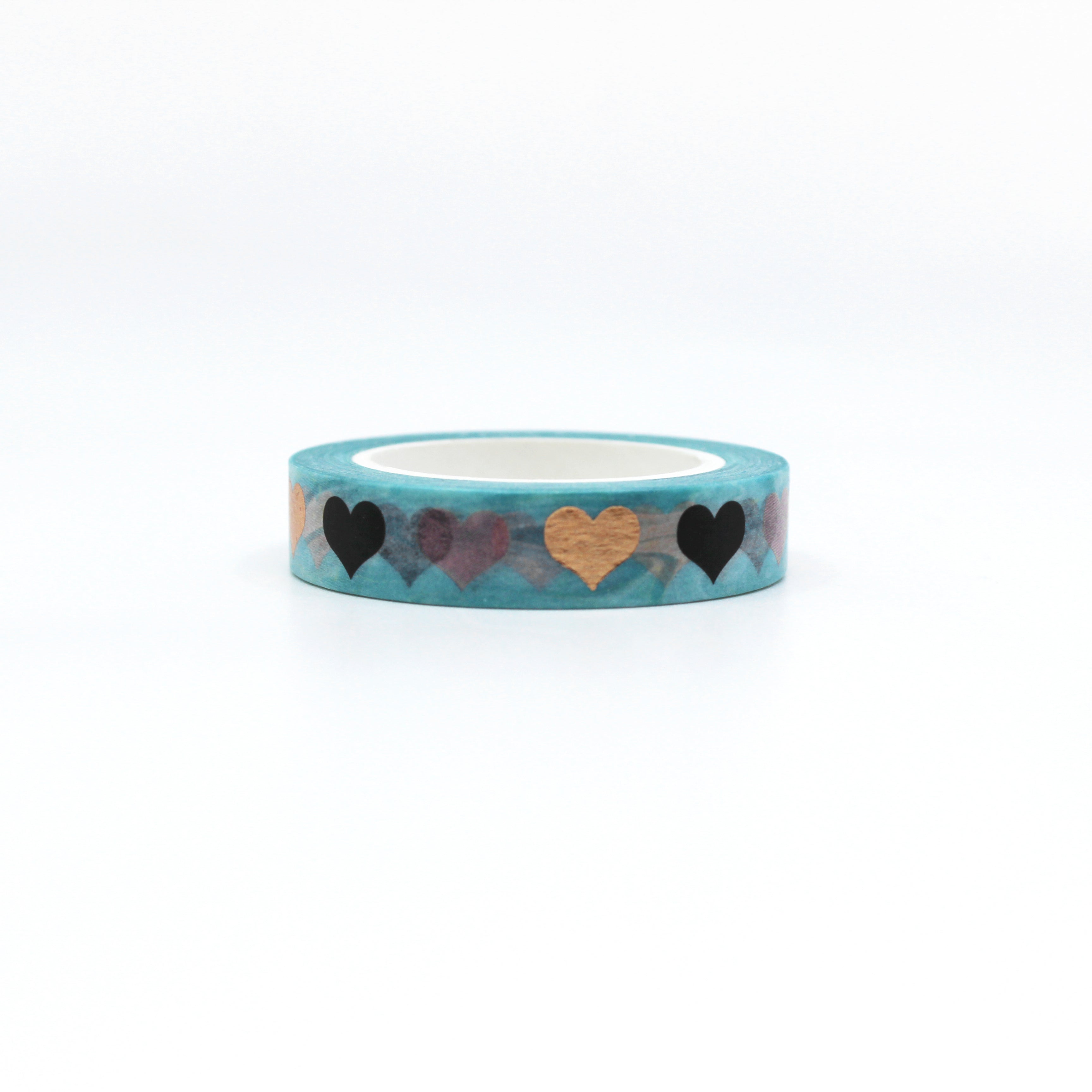 This playful and graphic foil tape featuring colorful hearts is a unique color choice but perfect for your valentine washi collection. This tape is sold at BBB Supplies craft shop.