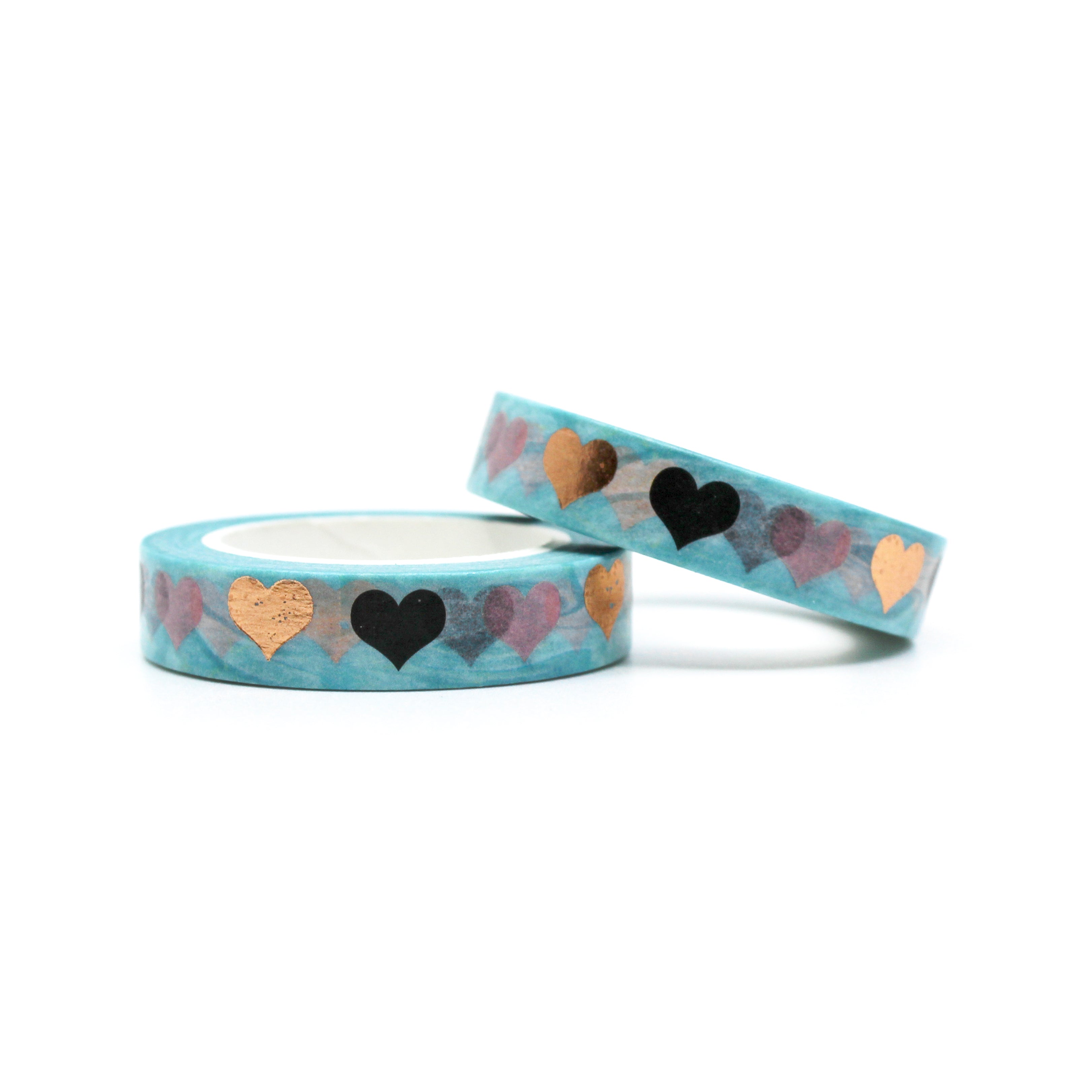 This playful and graphic foil tape featuring colorful hearts is a unique color choice but perfect for your valentine washi collection. This tape is sold at BBB Supplies craft shop.