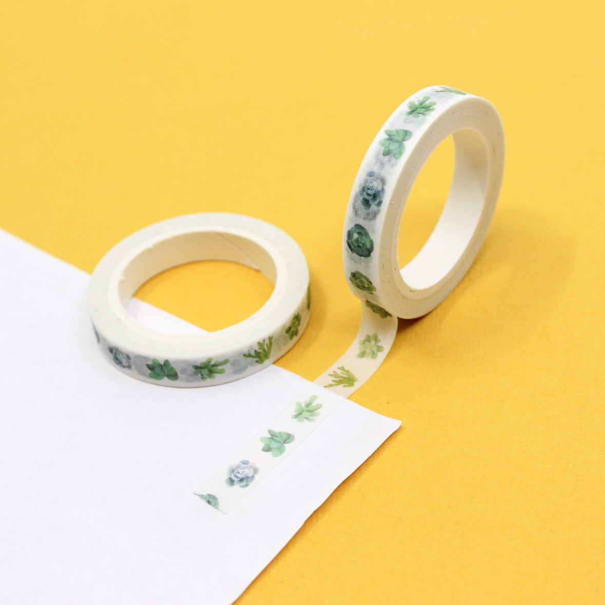 Bring a touch of nature to your projects with our Narrow Succulent Plants Washi Tape, featuring delicate and detailed succulent illustrations. Ideal for adding a touch of botanical charm to your crafts. This tape is sold at BBB Supplies Craft Shop.
