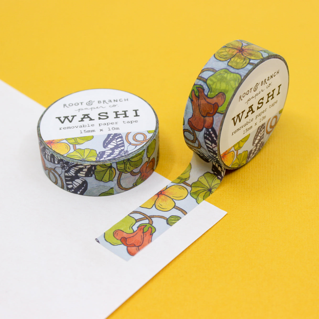 Nasturtium Garden and Swallowtail Butterfly Washi Tape, showcasing vibrant nasturtium blooms amidst graceful swallowtail butterflies in a stunning design. This tape from Root & Branch Paper co. is sold at BBB Supplies Craft Shop.