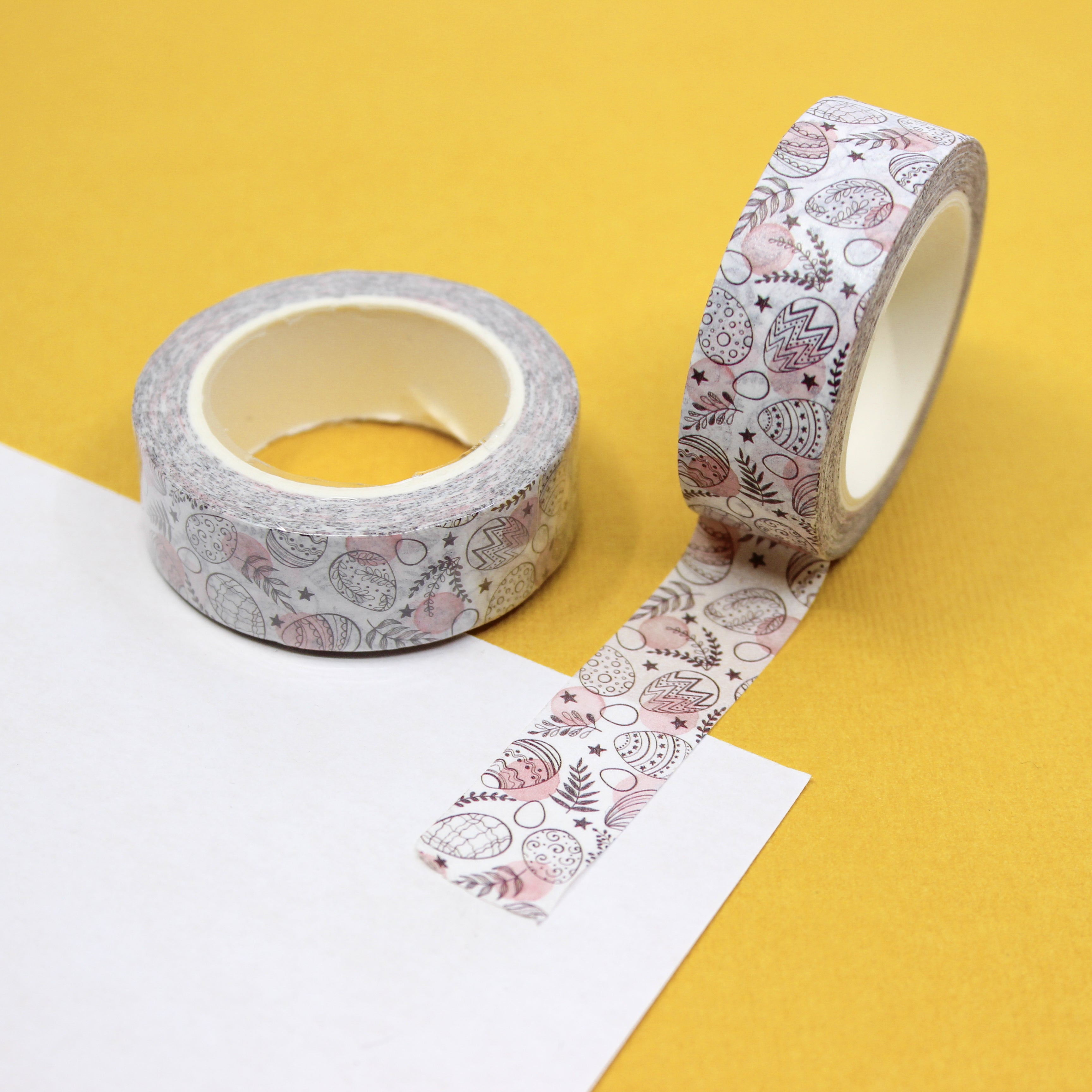 Pastel Easter Eggs Pattern Washi Tape: Decorate your Easter projects with this delightful washi tape featuring a pattern of colorful pastel Easter eggs. Perfect for adding a festive touch to cards, scrapbooks, and more! This tape is sold at BBB Supplies Craft Shop.