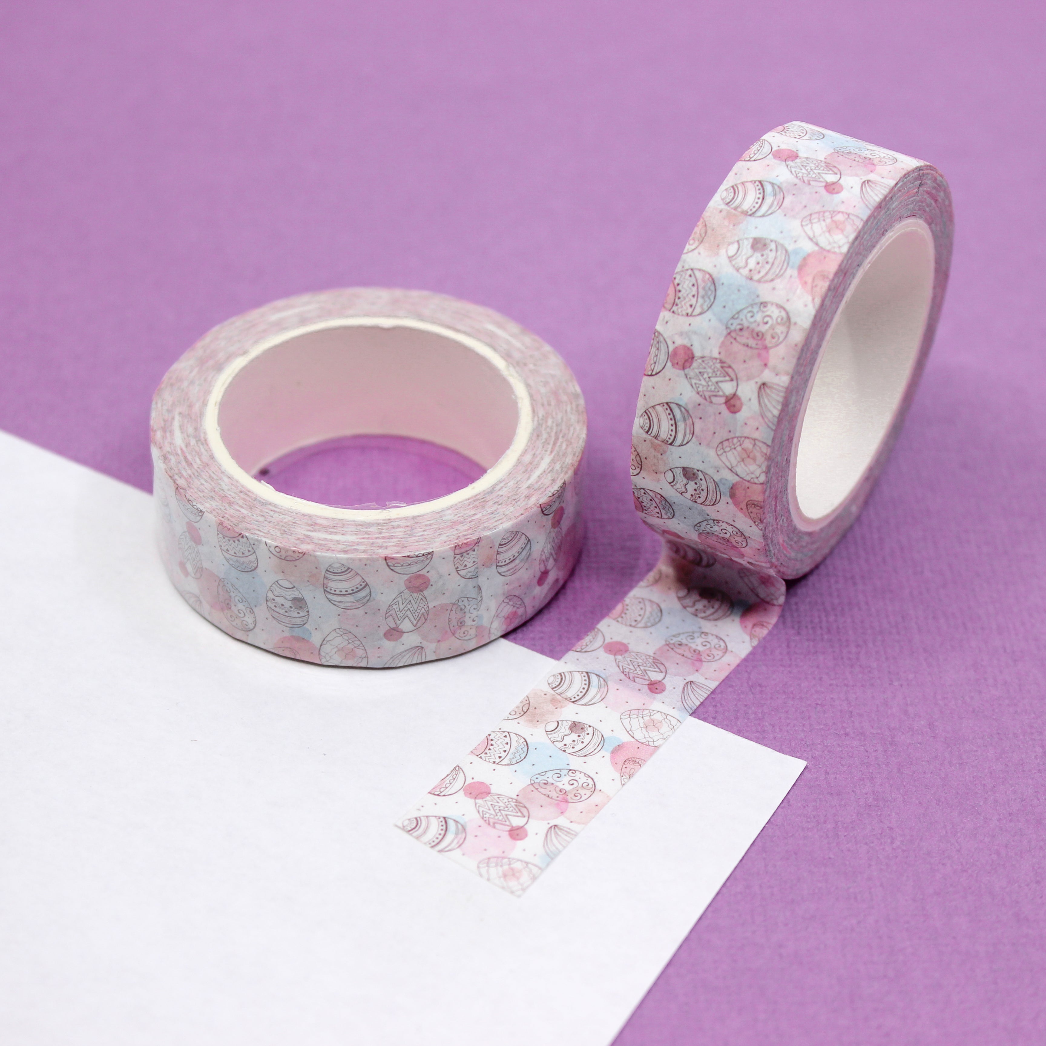 Pastel Easter Eggs Pattern Washi Tape: Decorate your Easter projects with this delightful washi tape featuring a pattern of colorful pastel Easter eggs. Perfect for adding a festive touch to cards, scrapbooks, and more! This tape is sold at BBB Supplies Craft Shop.