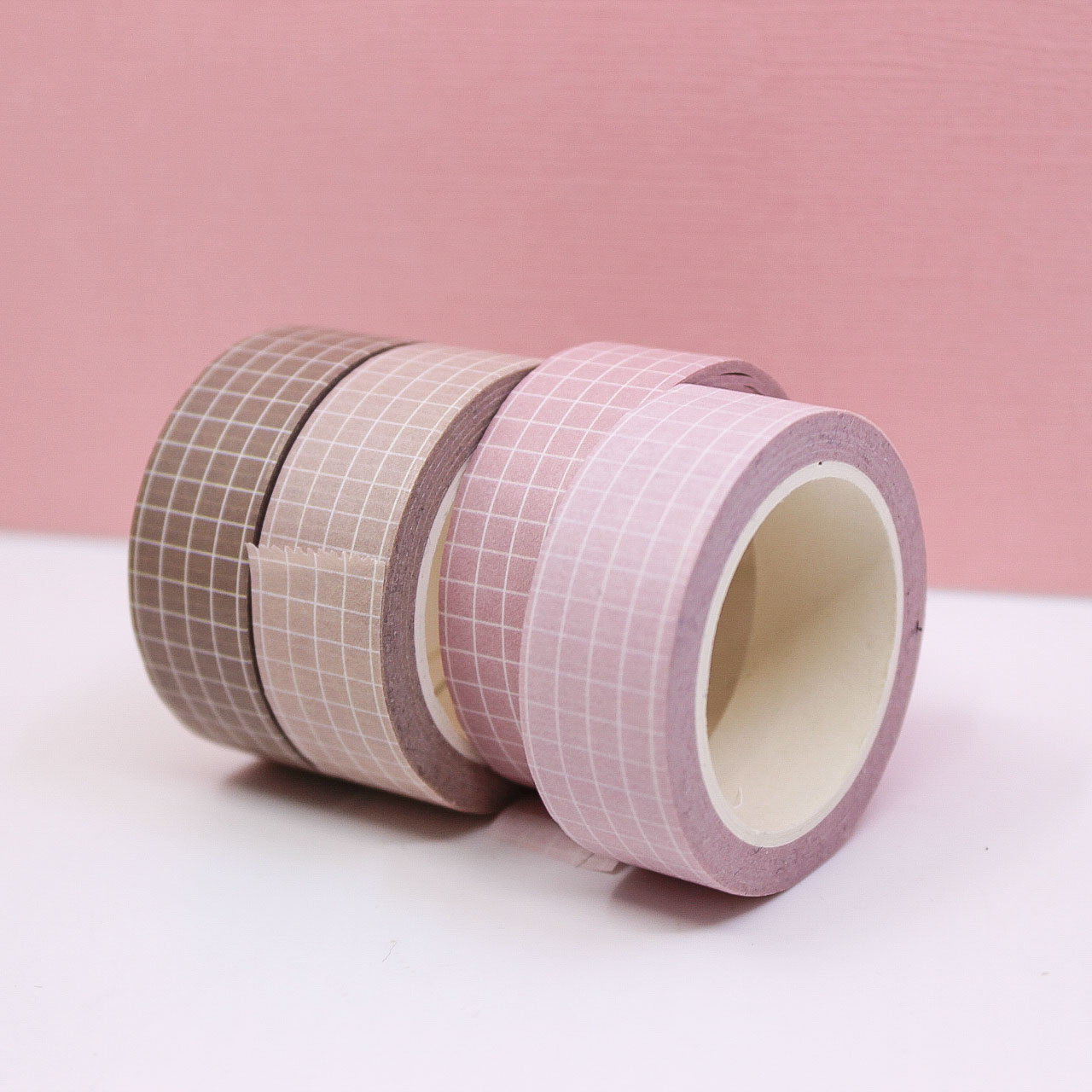 Soft neutrals grid washi tape in shades of soft pink, blush, light tan, and brown, featuring a minimalist grid pattern perfect for elegant and organized crafts.