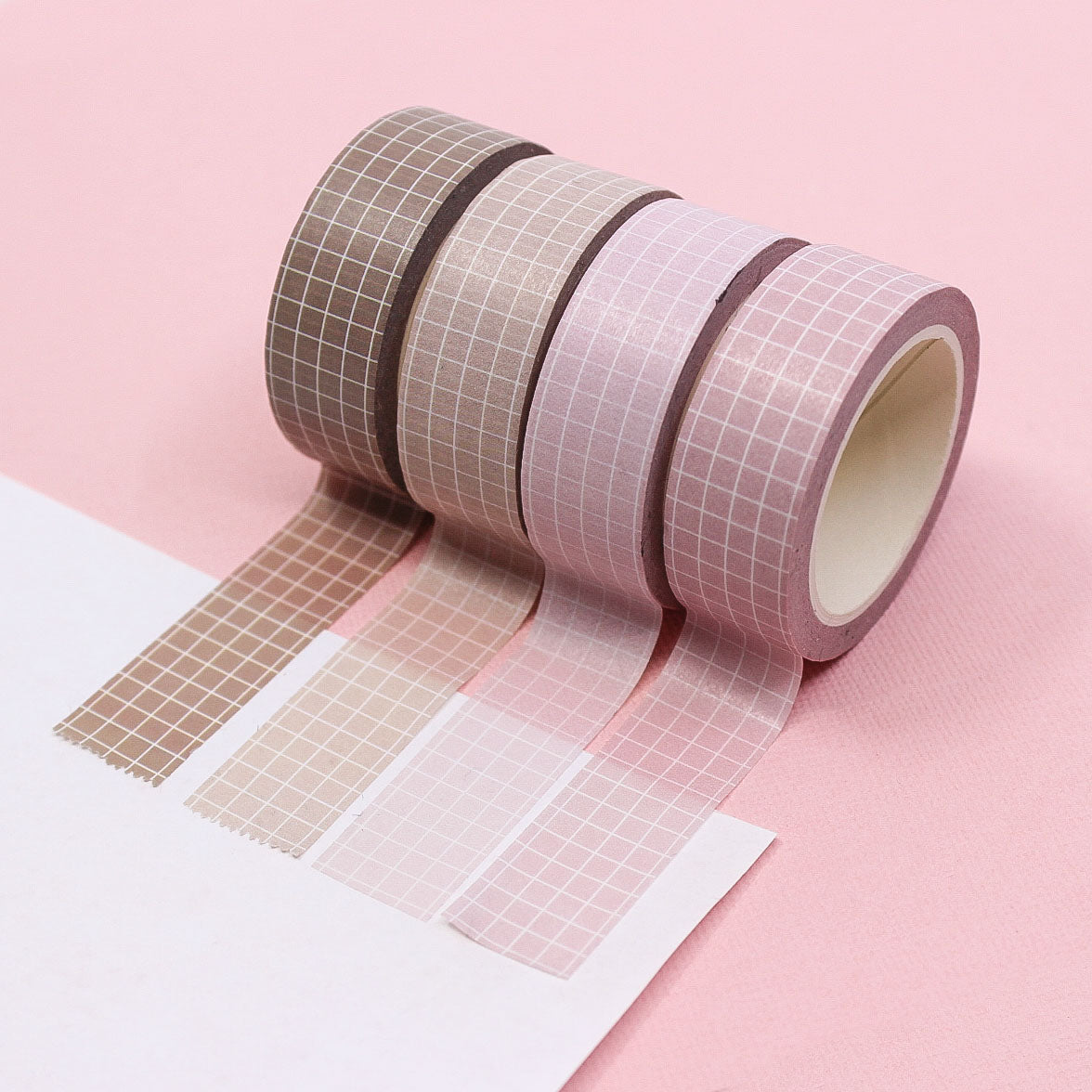 Soft neutrals grid washi tape in shades of soft pink, blush, light tan, and brown, featuring a minimalist grid pattern perfect for elegant and organized crafts.
