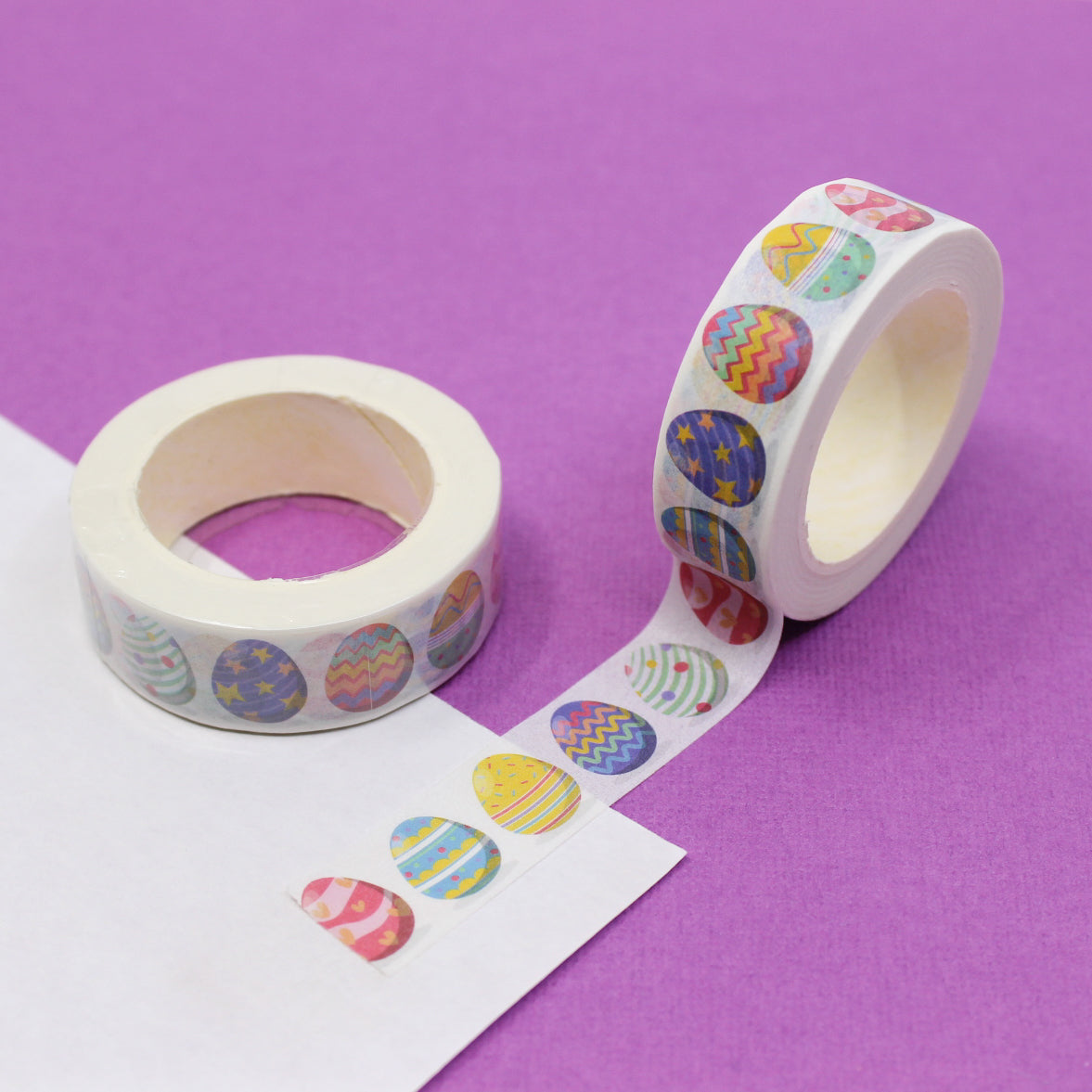 Patterned Easter Egg Washi Tape: Decorate your Easter projects with this charming washi tape featuring a variety of colorful and patterned Easter eggs, perfect for adding a festive touch to cards, gifts, and decorations. This tape is sold at BBB Supplies Craft Shop.