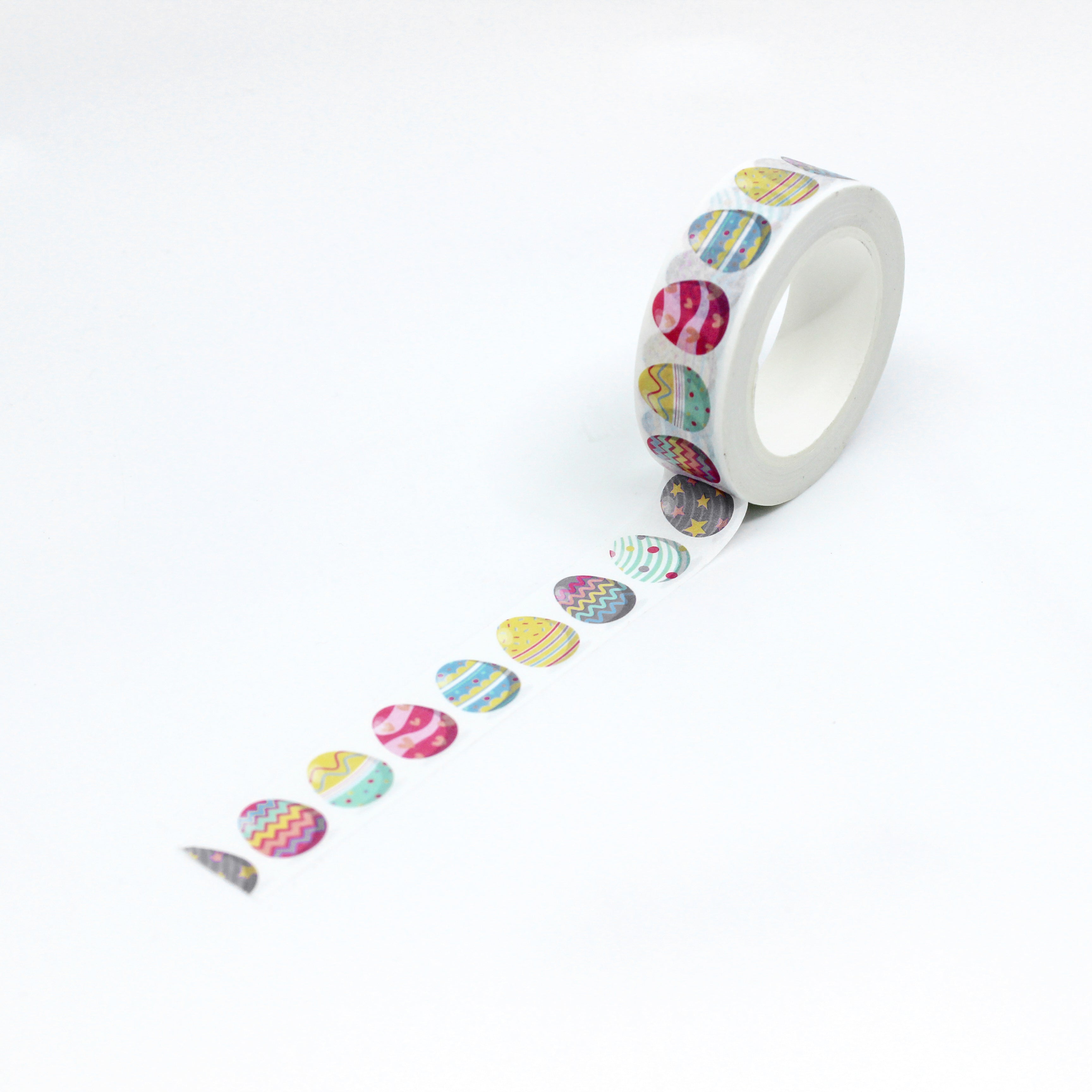 Patterned Easter Egg Washi Tape: Decorate your Easter projects with this charming washi tape featuring a variety of colorful and patterned Easter eggs, perfect for adding a festive touch to cards, gifts, and decorations. This tape is sold at BBB Supplies Craft Shop.