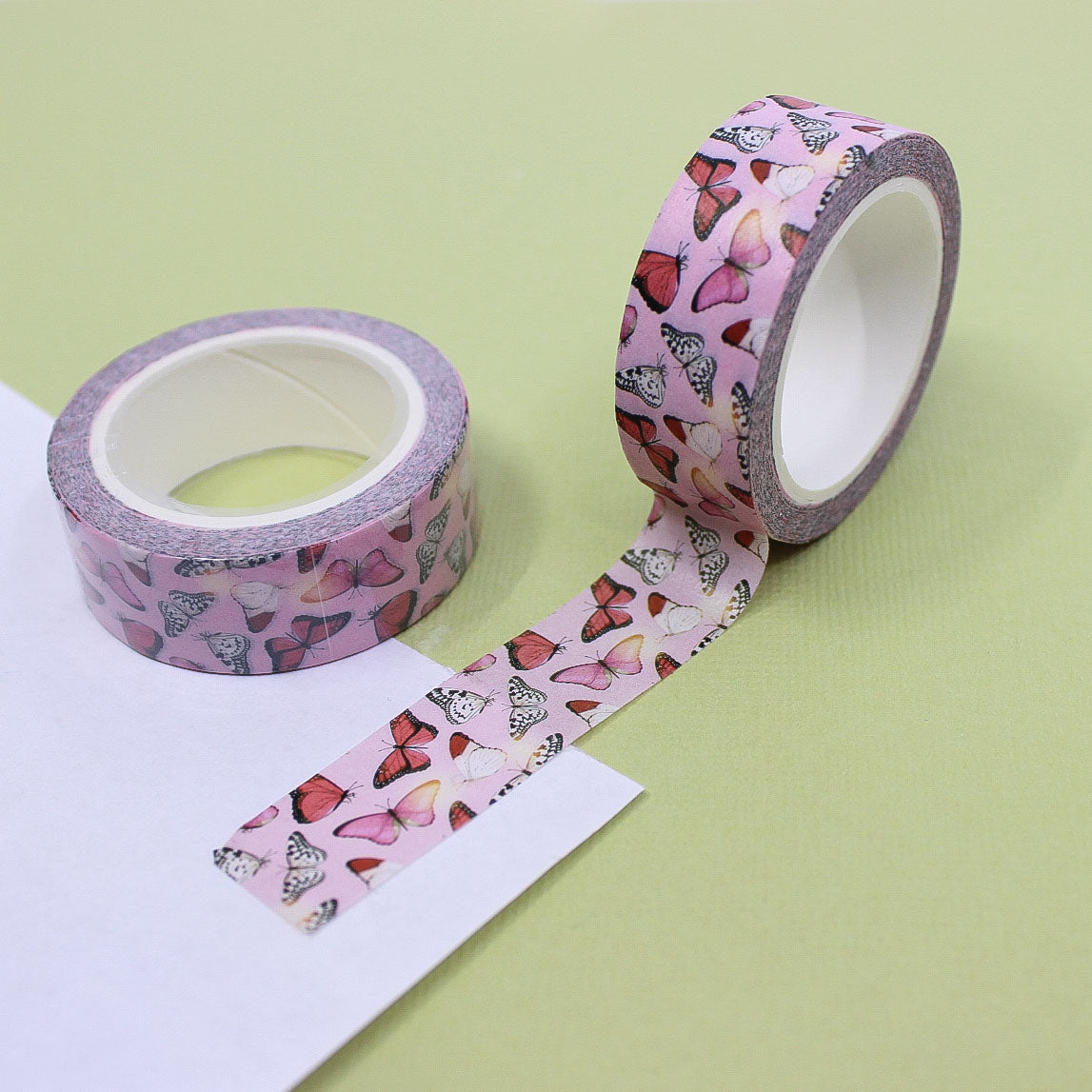 This bright and colorful washi tape features delicate pink butterflies, perfect for adding a whimsical and feminine touch to your crafts and journals. This tape is sold at BBB Supplies Craft Shop.