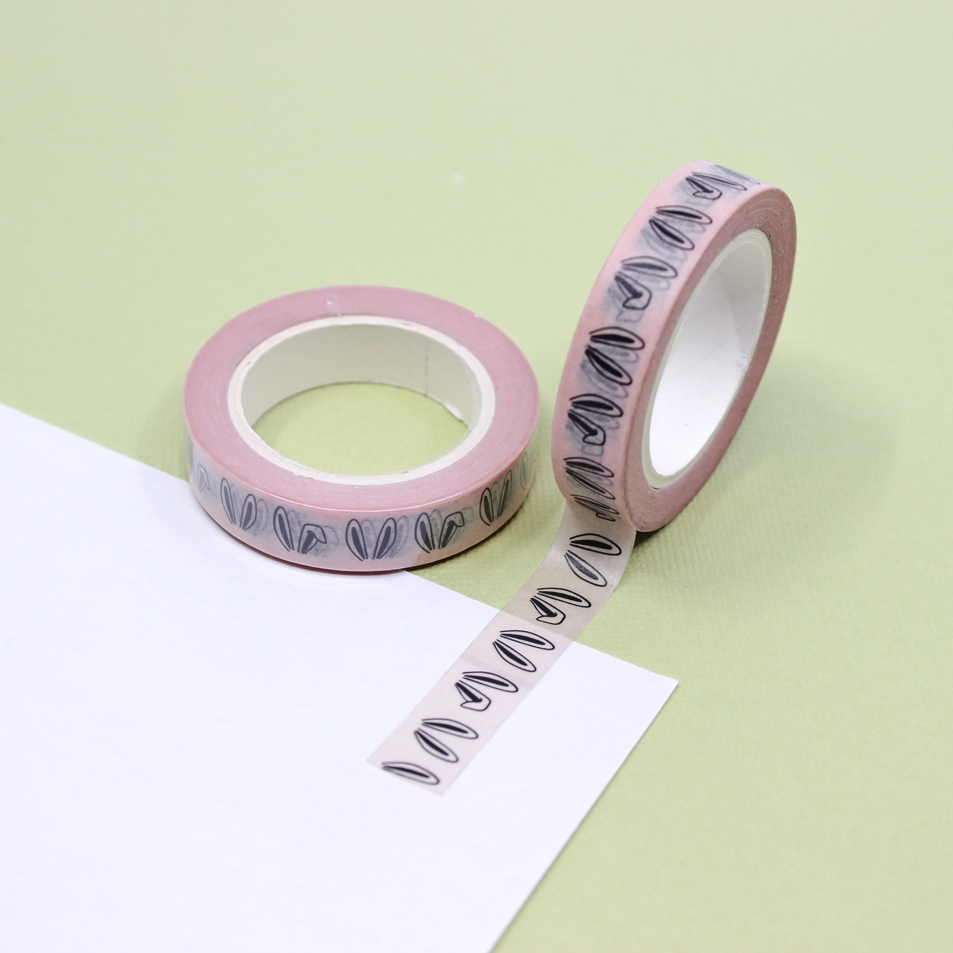 Pink Bunny Ears Washi Tape: Add a playful touch to your Easter crafts with this charming washi tape featuring a pattern of pink bunny ears. Perfect for decorating cards, gift wrap, and more! This tape is sold at BBB Supplies Craft Shop.