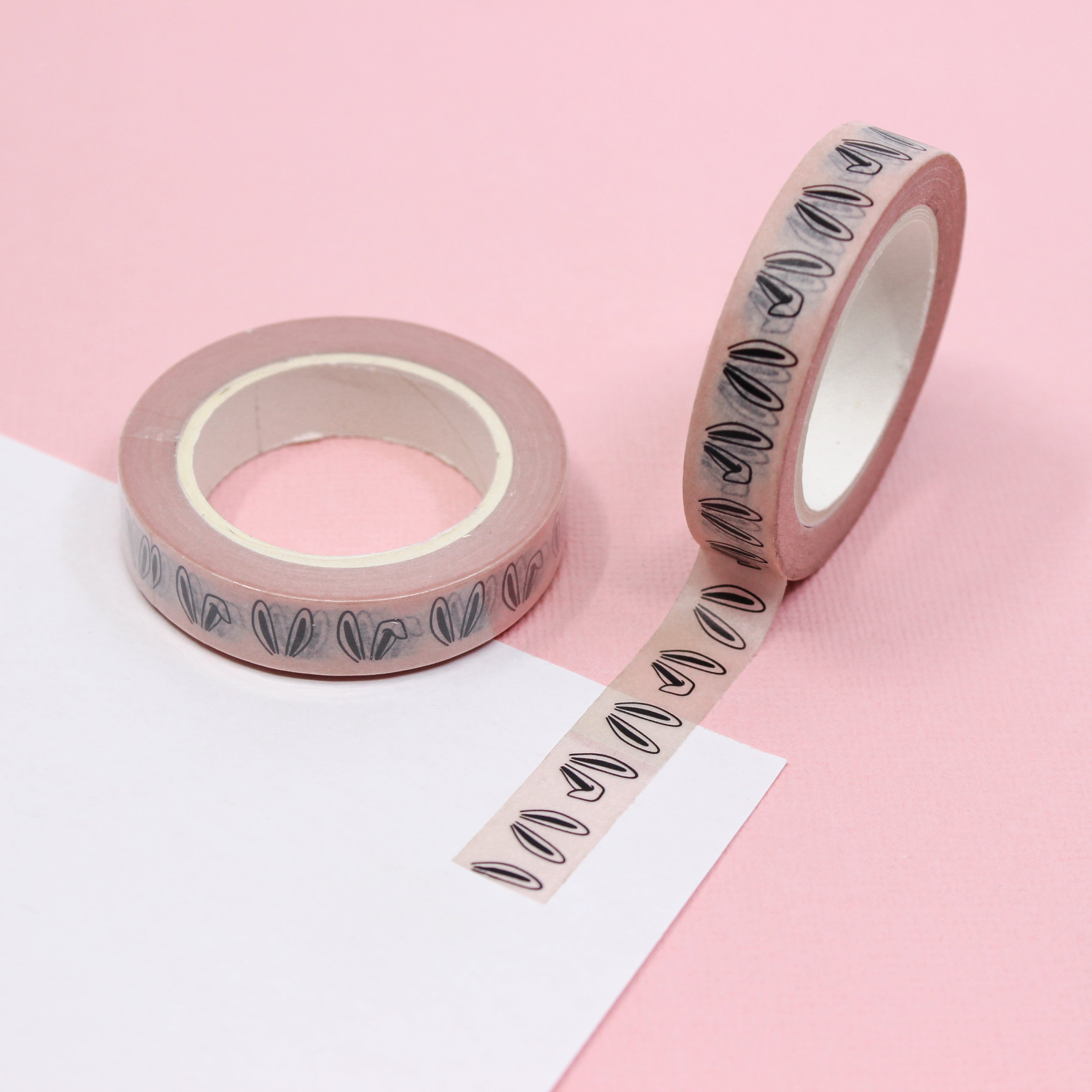 Pink Bunny Ears Washi Tape: Add a playful touch to your Easter crafts with this charming washi tape featuring a pattern of pink bunny ears. Perfect for decorating cards, gift wrap, and more! This tape is sold at BBB Supplies Craft Shop.