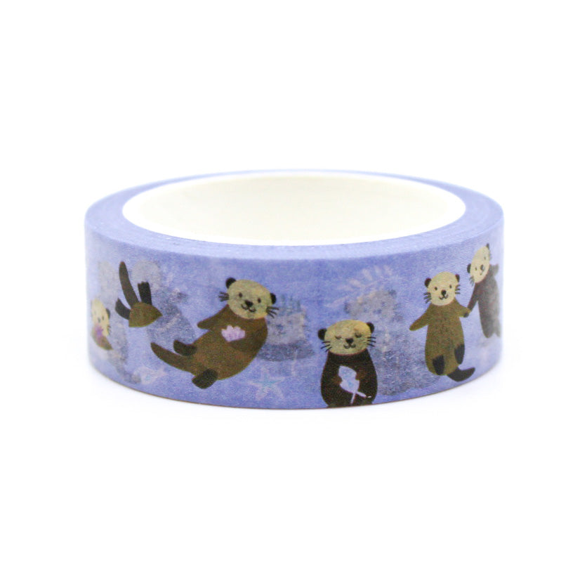 Dive into creativity with adorable sea otters in various poses, set against a playful purple backdrop. Perfect for scrapbooking beach memories or adding a marine theme to your journal! This tape is from Girl of All Work and sold at BBB Supplies Craft Shop.