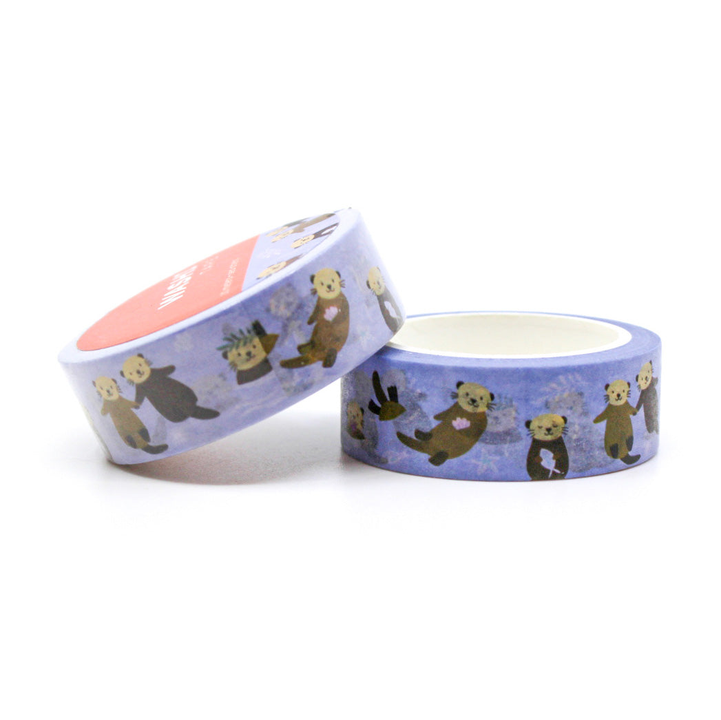 Dive into creativity with adorable sea otters in various poses, set against a playful purple backdrop. Perfect for scrapbooking beach memories or adding a marine theme to your journal! This tape is from Girl of All Work and sold at BBB Supplies Craft Shop.