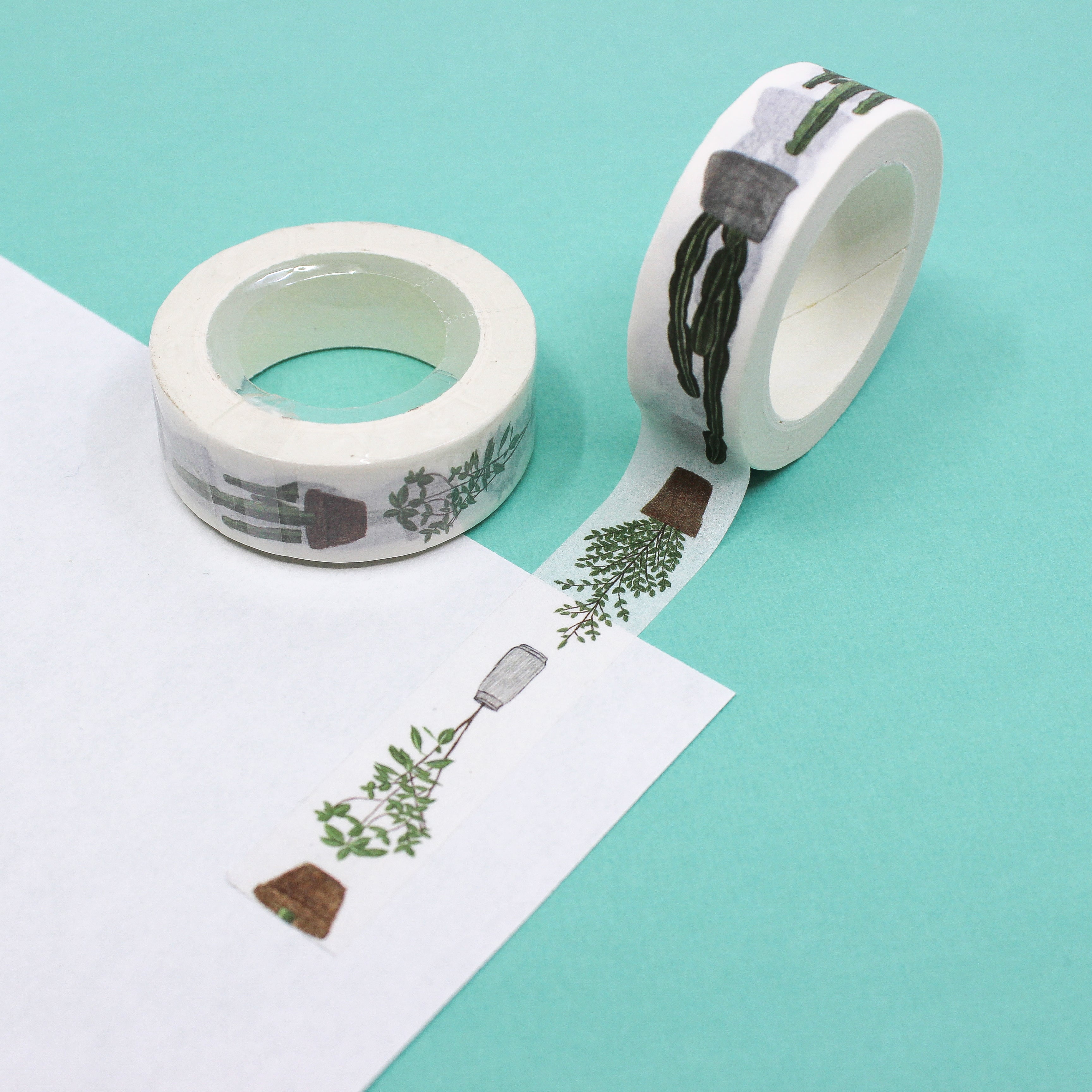 Add a touch of desert charm to your crafts with our Potted Succulent & Cactus Washi Tape, adorned with delightful succulent and cactus illustrations. Perfect for adding a whimsical and natural touch to your projects. This tape is sold at BBB Supplies Craft Shop.