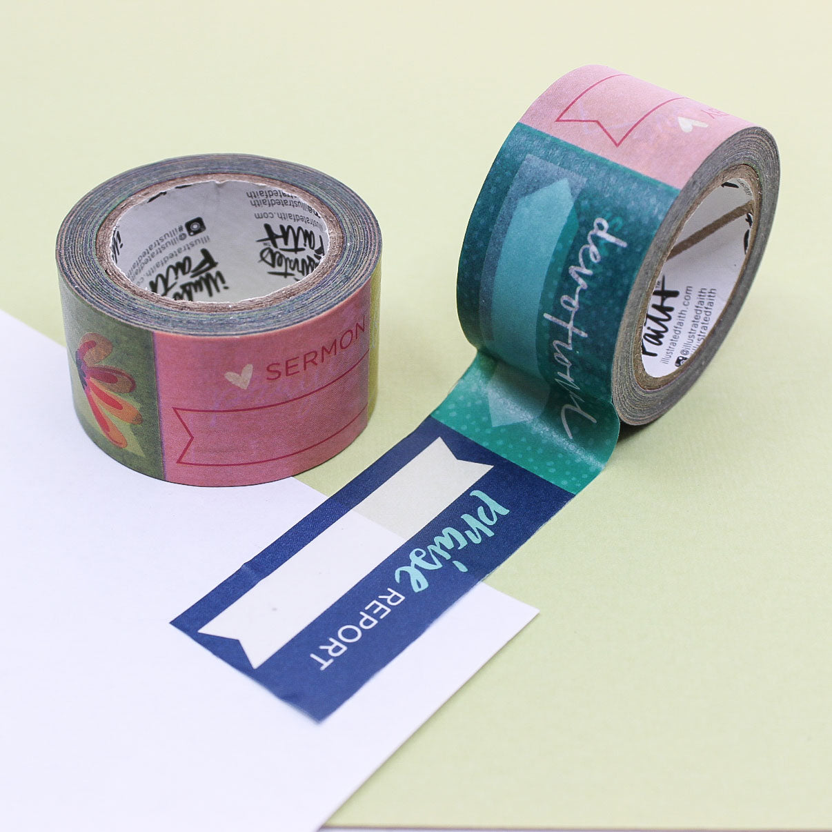 Sermon notes and devotional label washi tape roll unrolled onto white paper.