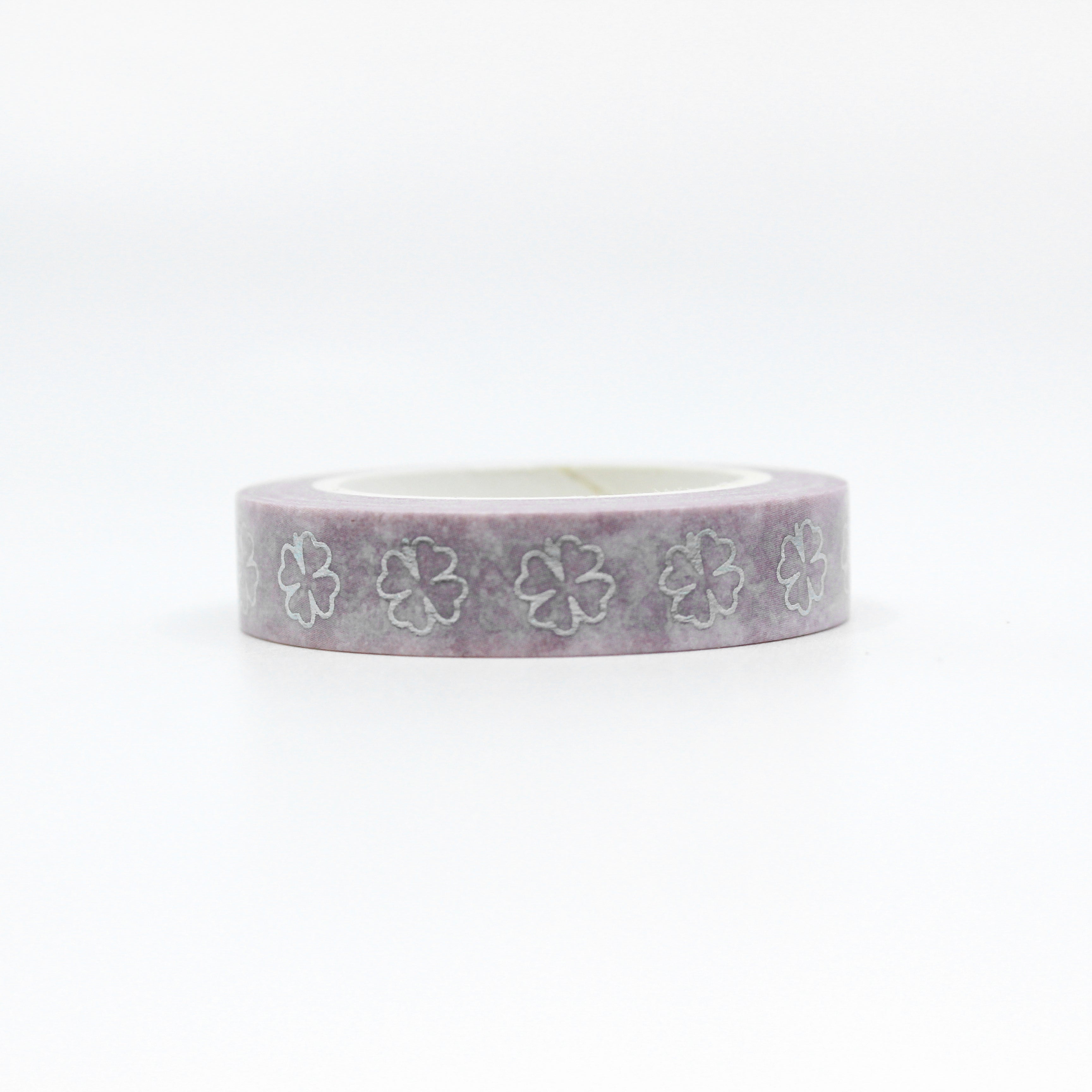 Purple & Silver Foil Clover Washi Tape: Add a touch of elegance and luck to your projects with this washi tape featuring a pattern of purple clovers accented with silver foil. Perfect for St. Patrick's Day or any project that needs a bit of charm. This tape is sold at BBB Supplies Craft Shop.
