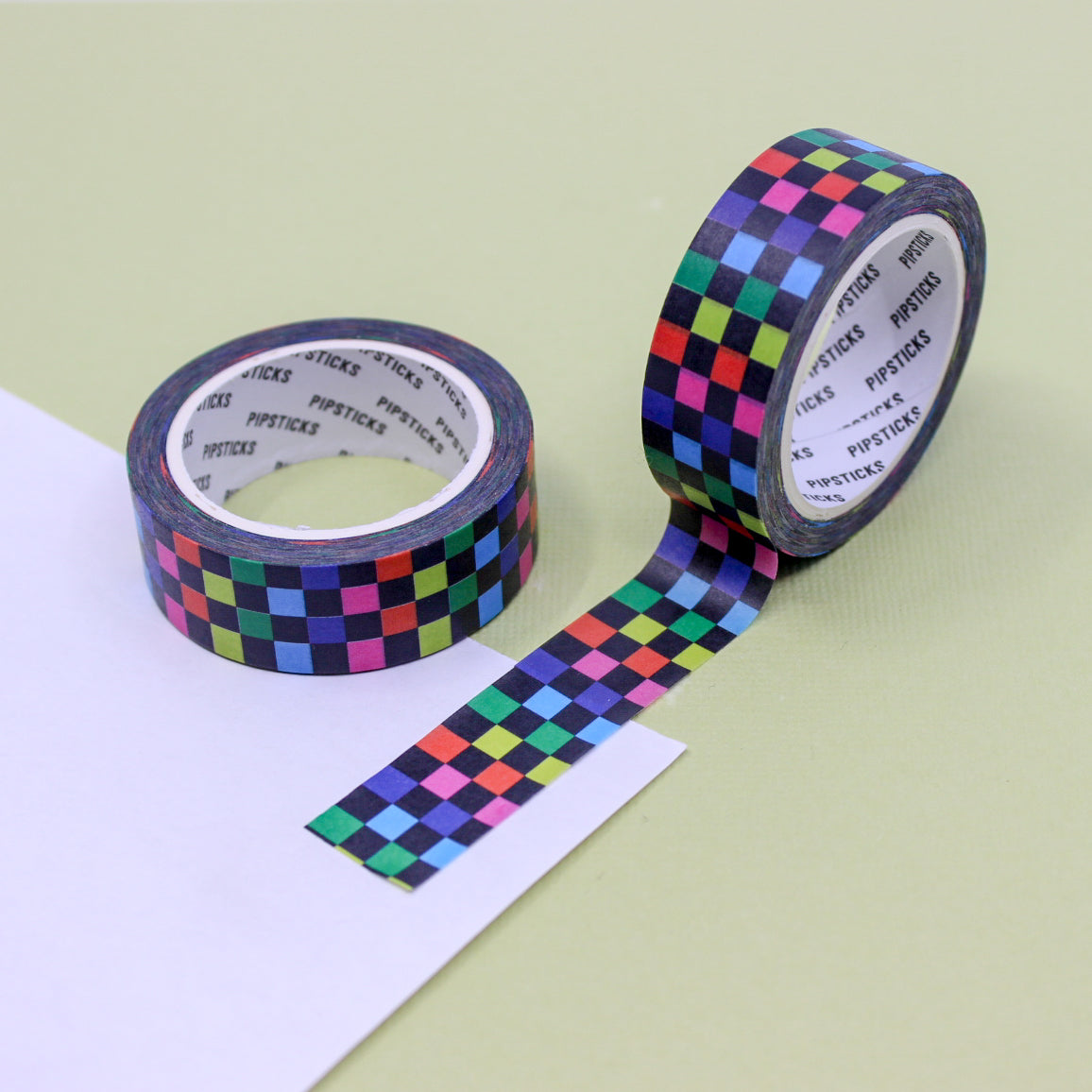 Brighten up your crafting and planning with our Rainbow Colors Checkered Washi Tape. This vibrant tape features a bold, multicolored checkered pattern, perfect for adding a splash of fun to your projects.