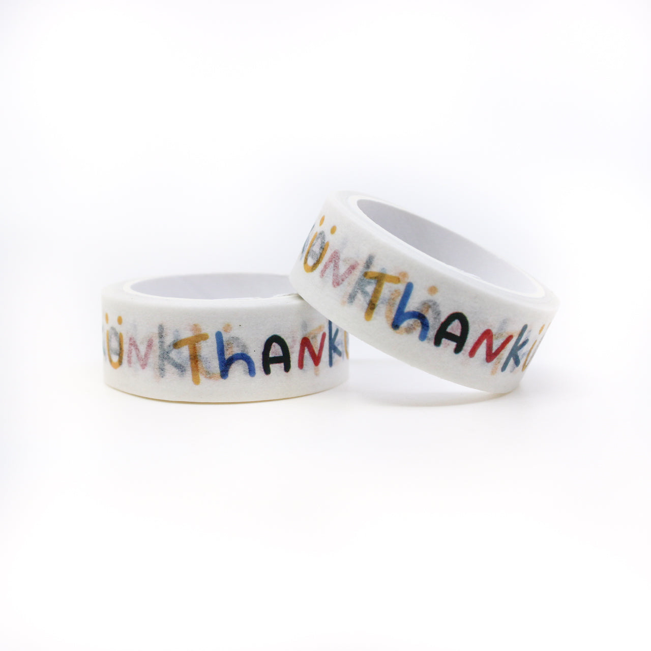 Vibrant washi tape featuring the words 'Thank U' alongside a cheerful smiling face. This playful design on a crisp white background adds a touch of gratitude and joy to your crafting projects. This tape is sold at BBB Supplies Craft Shop.