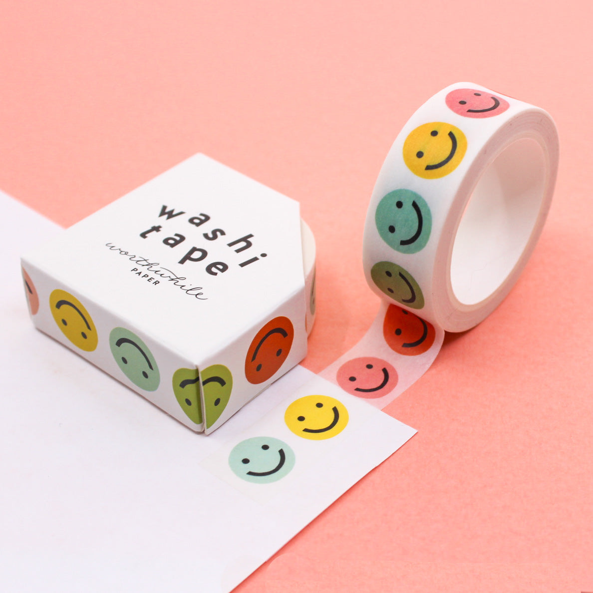 Vibrant Rainbow Colors Smiley Face Washi Tape, featuring cheerful expressions on a colorful background, adding a playful touch to your creative projects. This tape is from Worthwhile Papers and sold at BBB Supplies Craft Shop.