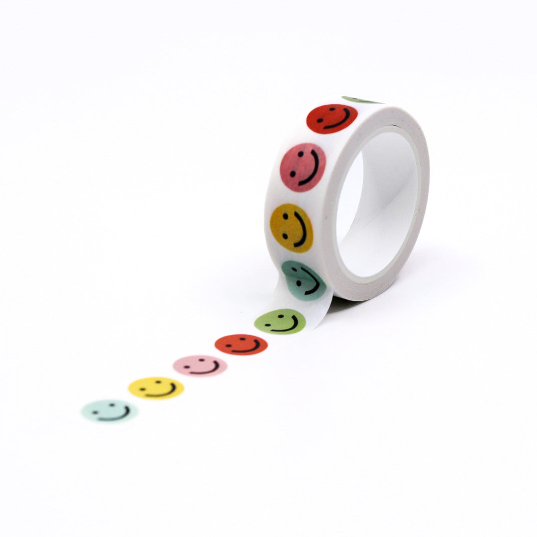 Vibrant Rainbow Colors Smiley Face Washi Tape, featuring cheerful expressions on a colorful background, adding a playful touch to your creative projects. This tape is from Worthwhile Papers and sold at BBB Supplies Craft Shop.