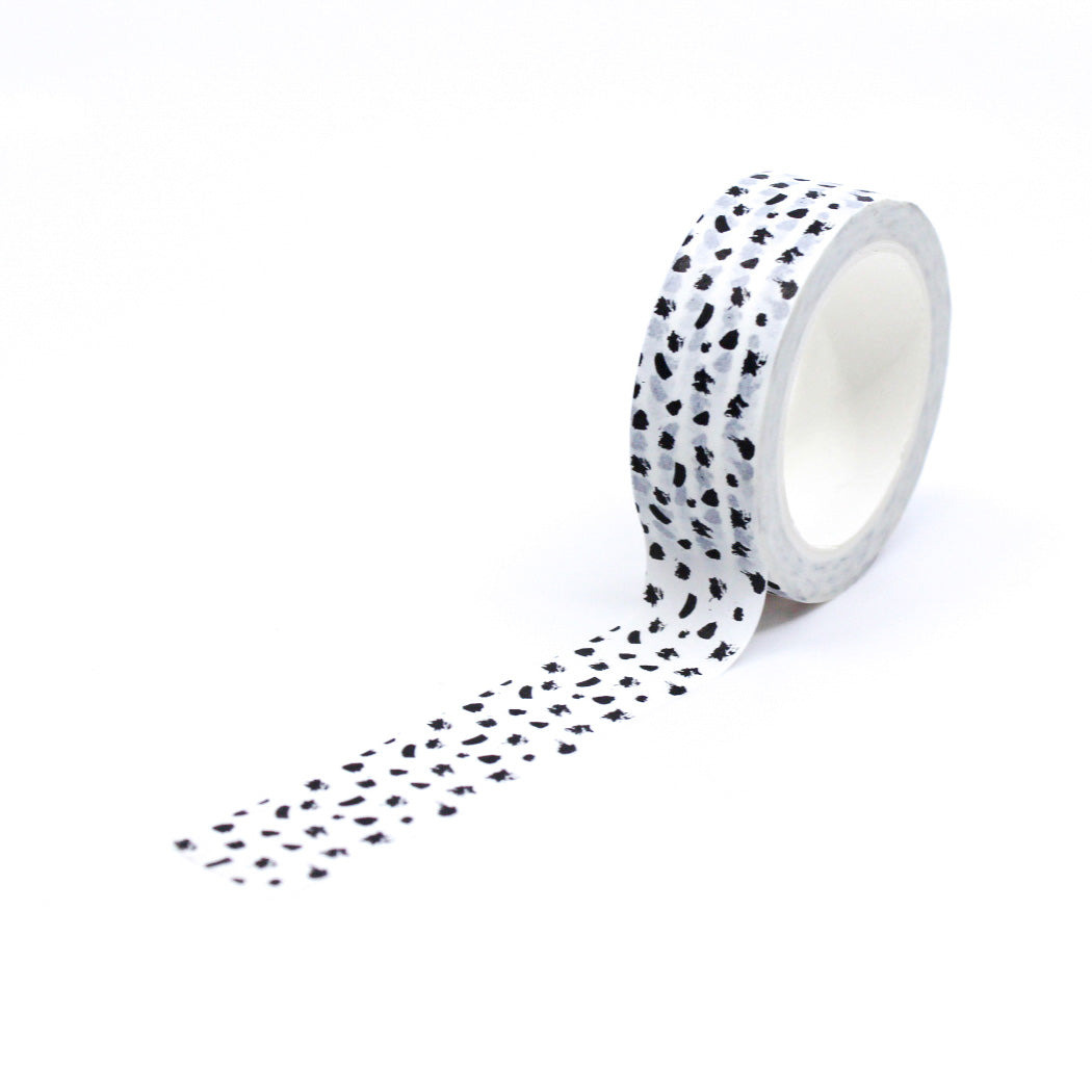 Add a touch of contemporary flair to your projects with this washi tape featuring a modern abstract black and white dots design. Perfect for adding a stylish accent to your crafts. This tape is sold at BBB Supplies Craft Shop.