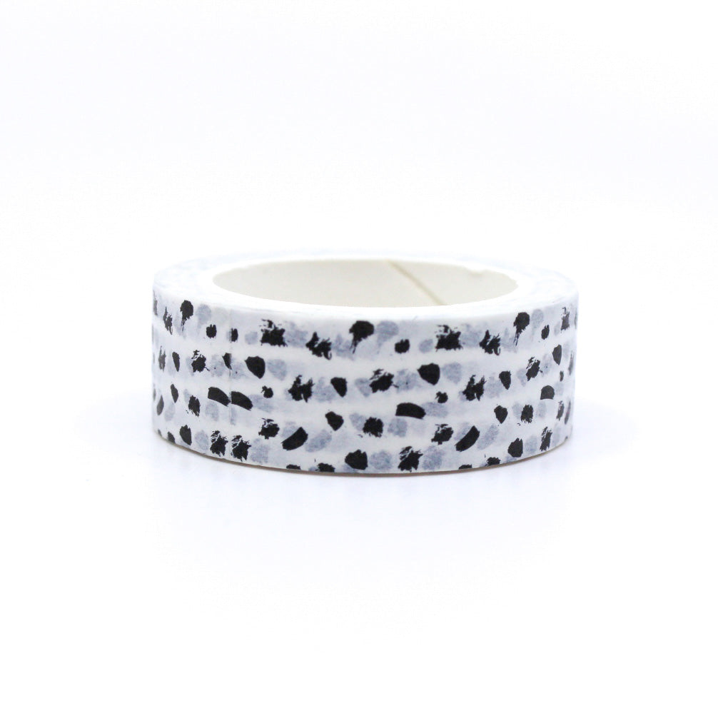 Add a touch of contemporary flair to your projects with this washi tape featuring a modern abstract black and white dots design. Perfect for adding a stylish accent to your crafts. This tape is sold at BBB Supplies Craft Shop.