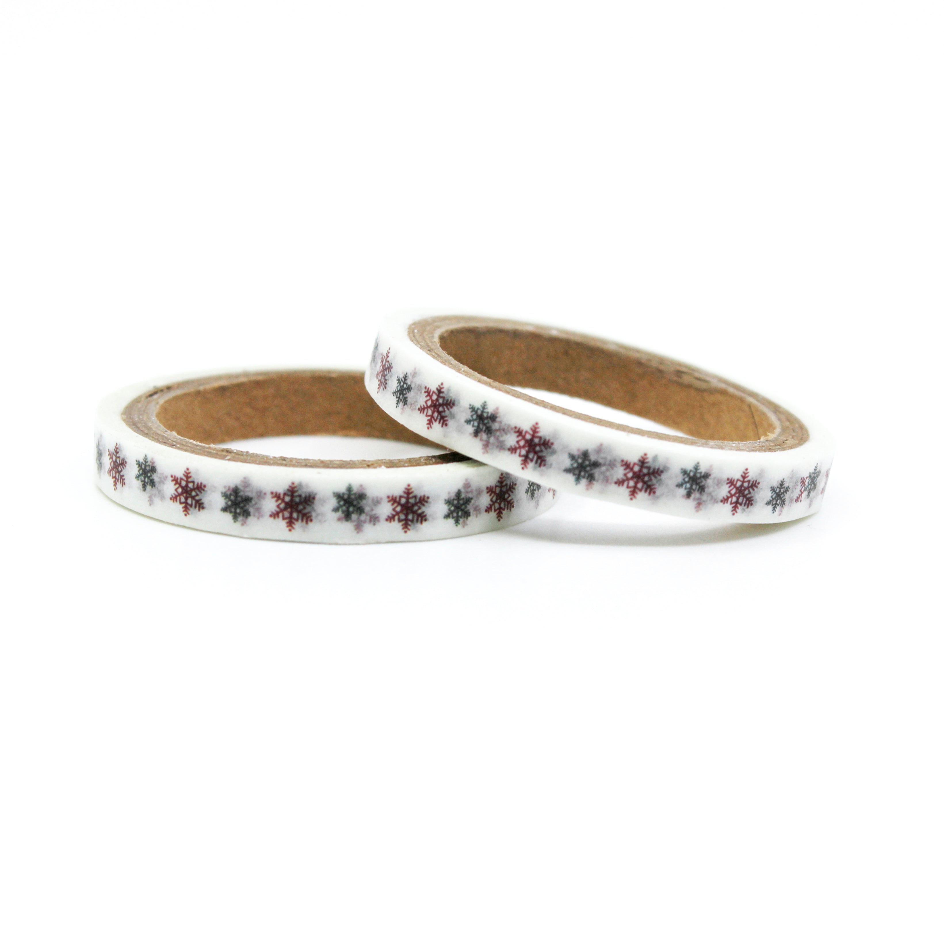 Elevate your creations with our captivating red and green snowflake washi tape, showcasing charming snowflake motifs that capture the essence of a winter wonderland and holiday magic. This tape is sold at BBB Supplies Craft Shop.