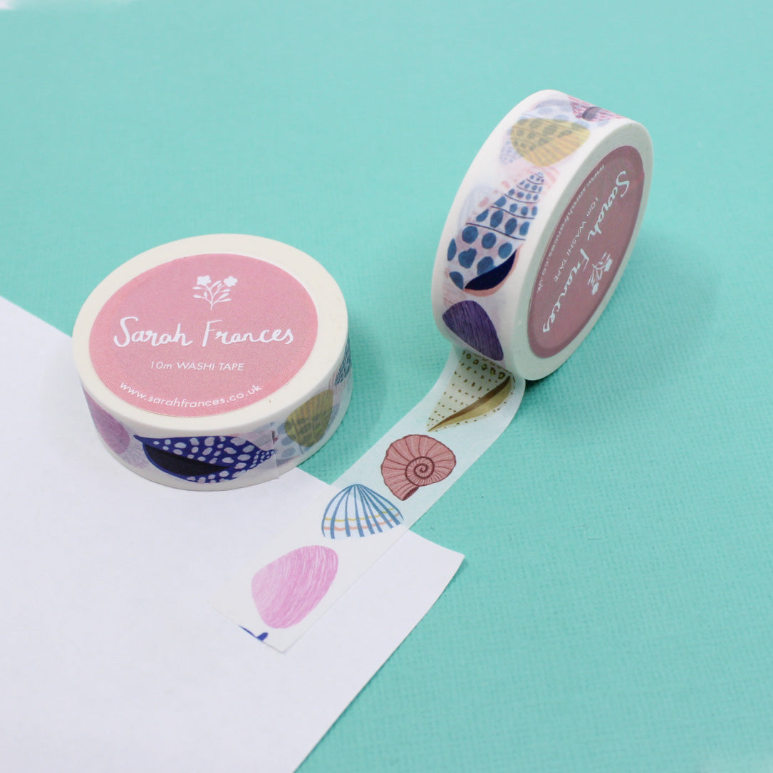 "Beach Seashell Washi" showcases a charming design of seashells, capturing the essence of coastal beauty for your creative projects.