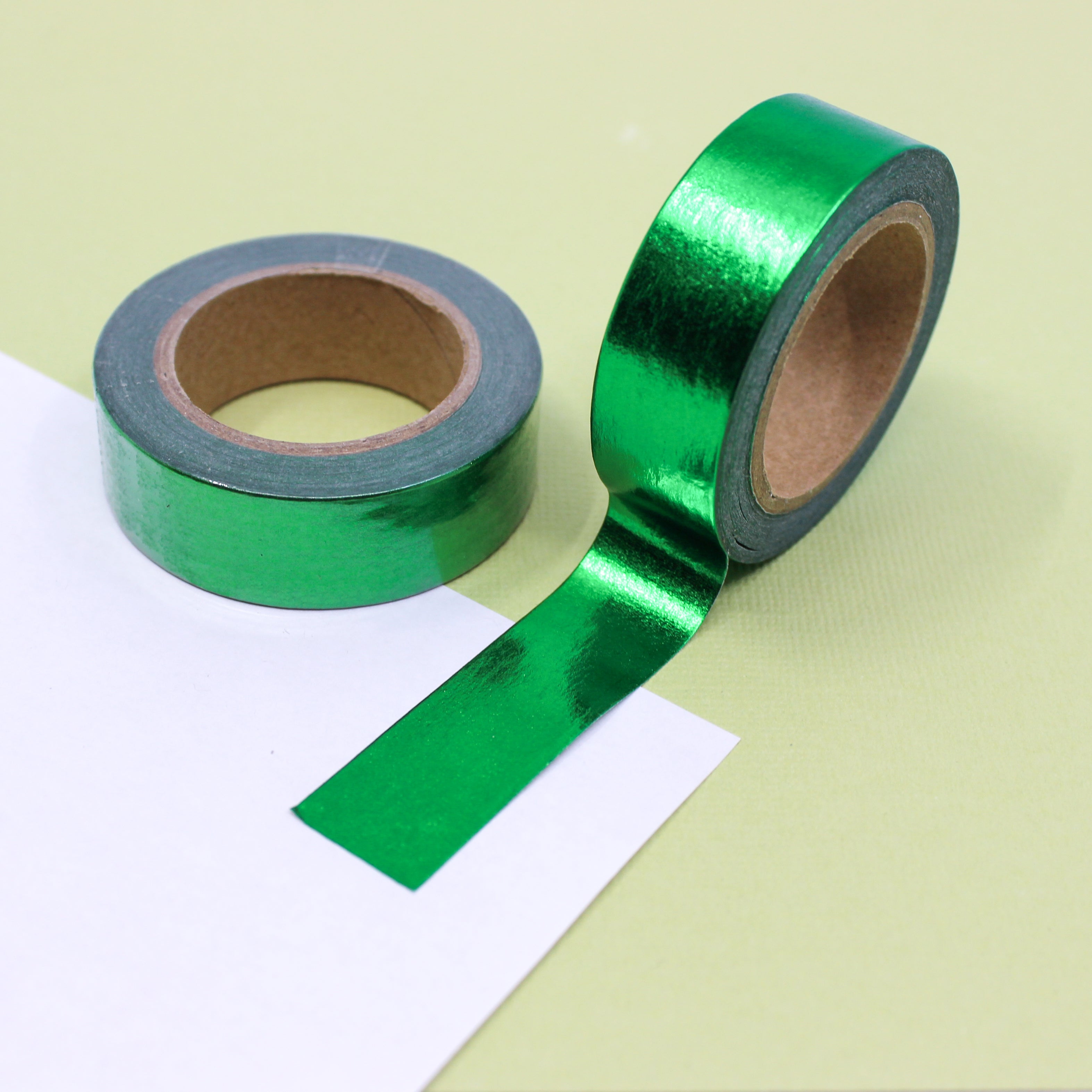 Elevate your projects with our captivating green foil washi tape, showcasing a vibrant green color with a luxurious foil sheen for a glamorous touch. This tape is sold at BBB Supplies Craft Shop.