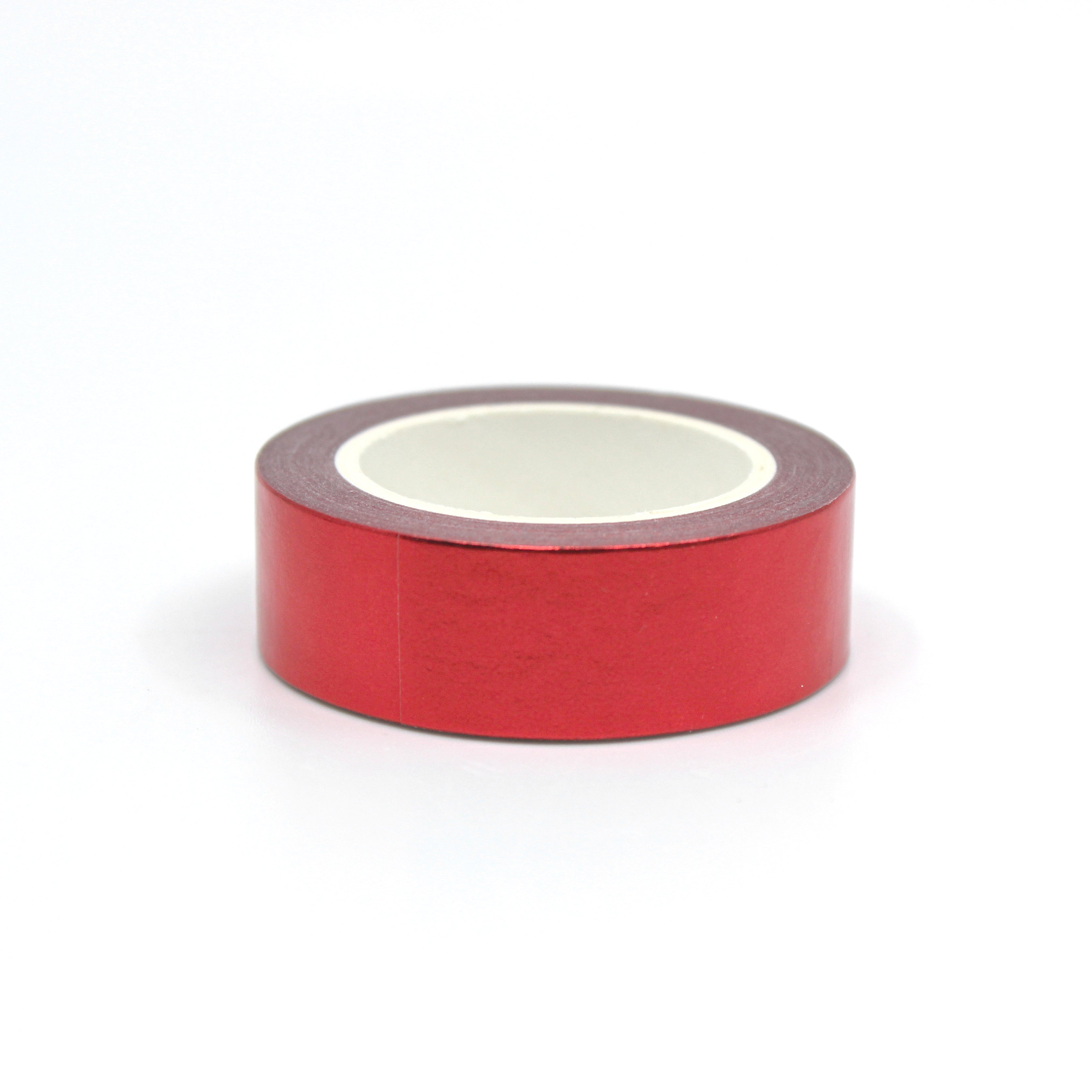 Add a touch of elegance to your crafts with our dazzling red foil washi tape, featuring a shimmering metallic finish that catches the light. This tape is sold at BBB Supplies Craft Shop.