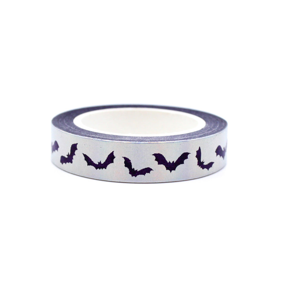 Get in the Halloween spirit with our Silver Foil Spooky Bats Washi Tape, featuring a haunting pattern of bats in shimmering silver foil. Ideal for adding a spooky and stylish touch to your projects. This tape is sold at BBB Supplies Craft Shop.
