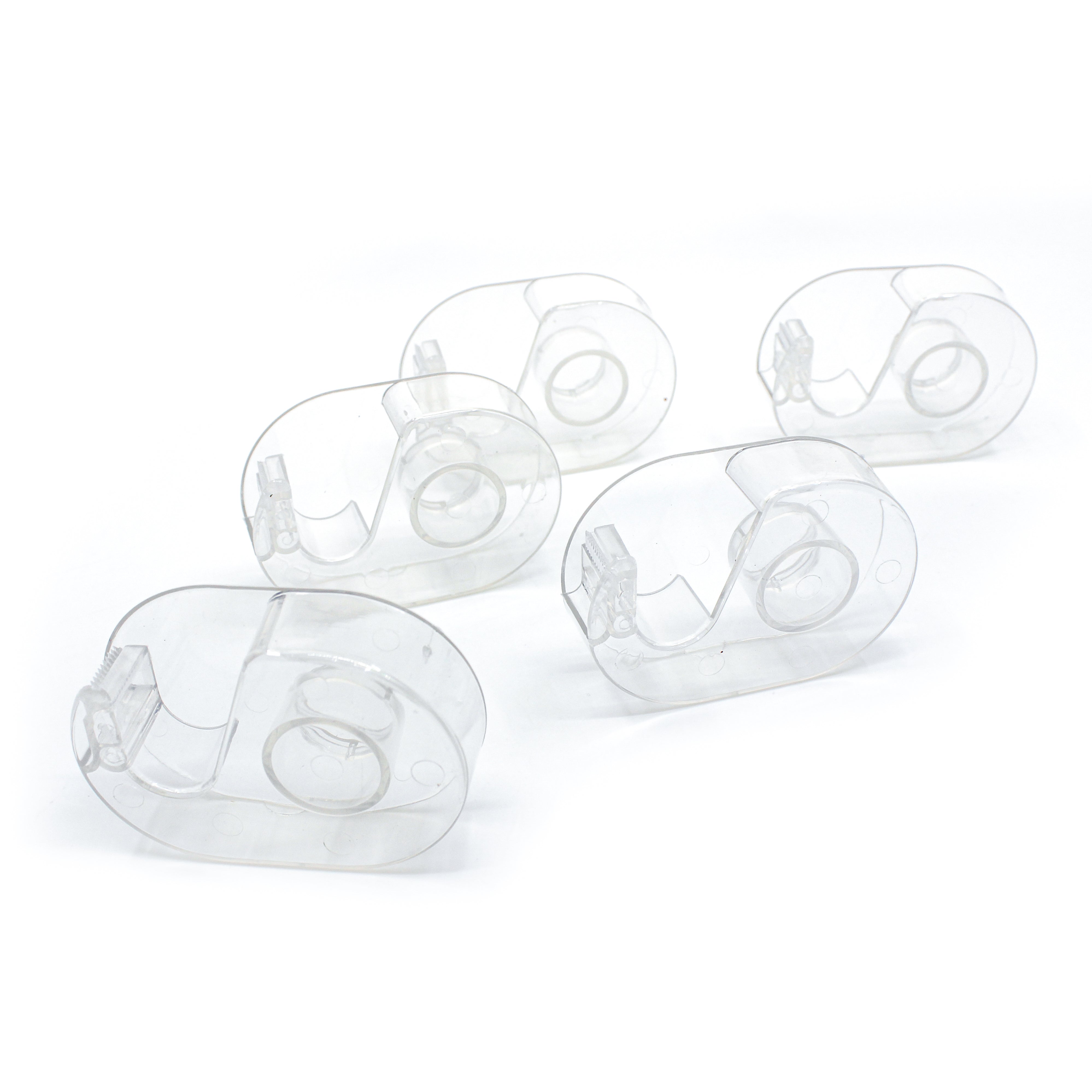 view of empty washi holder on a white background with tape ready to use