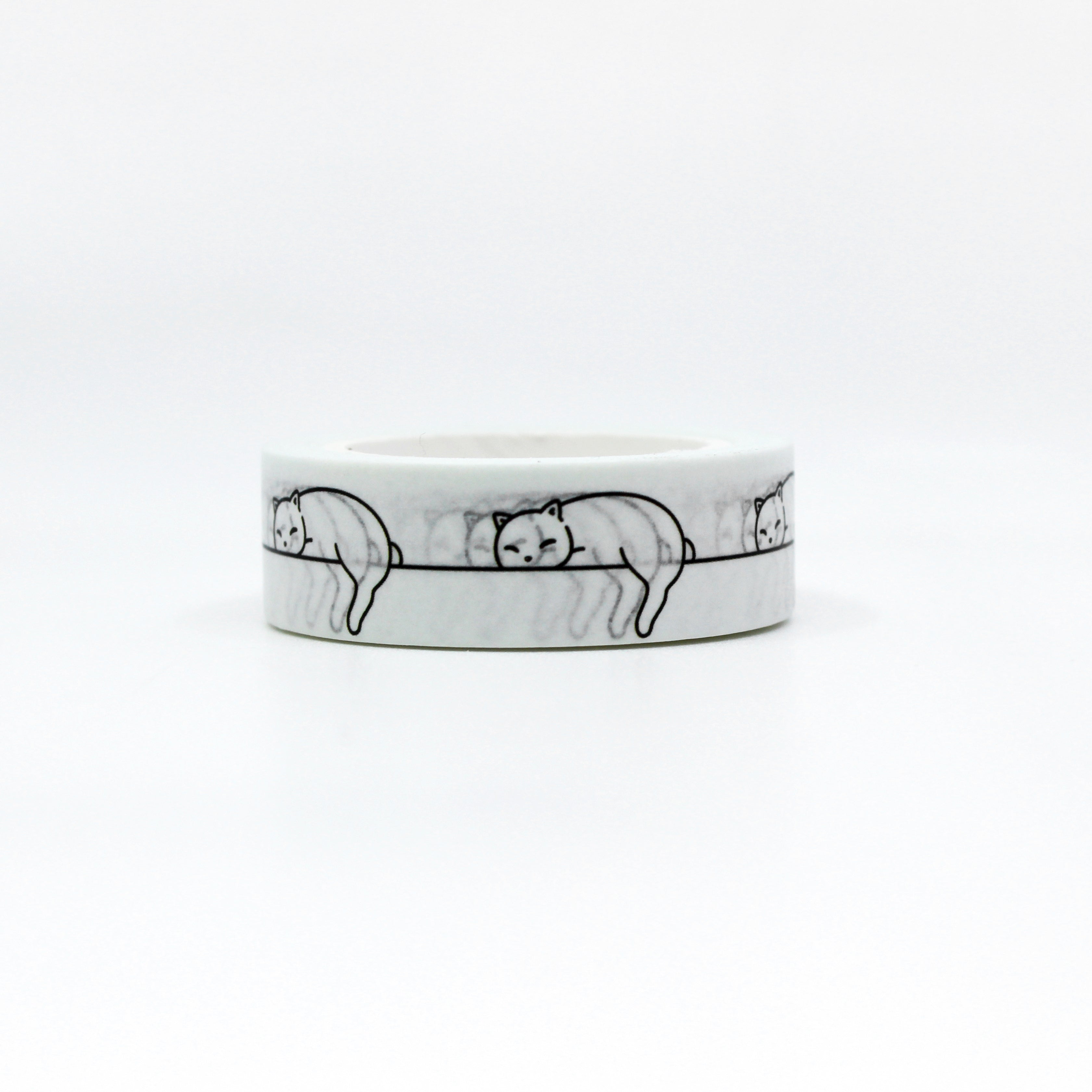 Embrace coziness and charm with our Sleeping Cat Washi Tape, featuring adorable cat illustrations. Ideal for adding a touch of feline sweetness to your projects. This tape is sold at BBB Supplies Craft Shop.