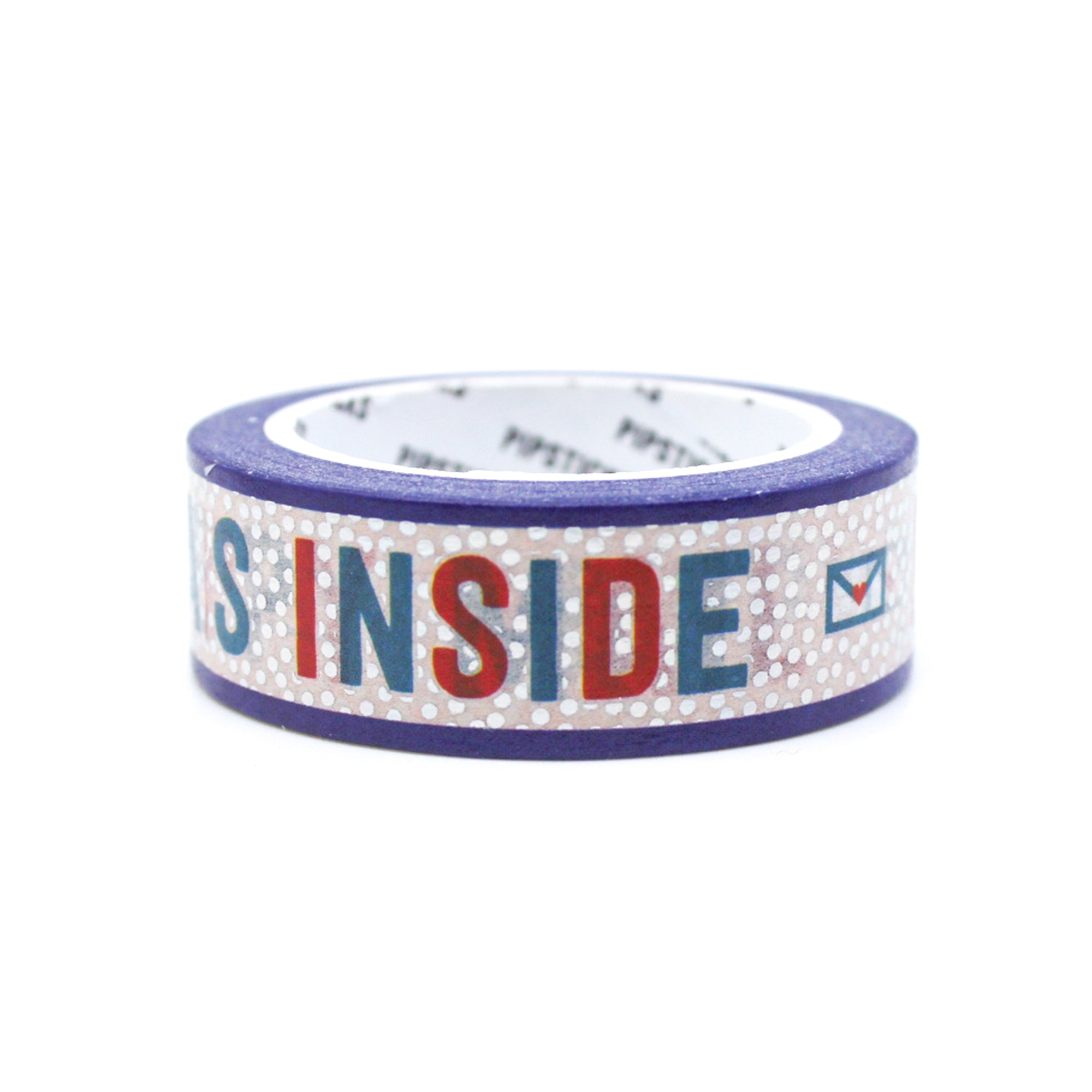 Decorative tape used to seal a happy mail envelope with silver script