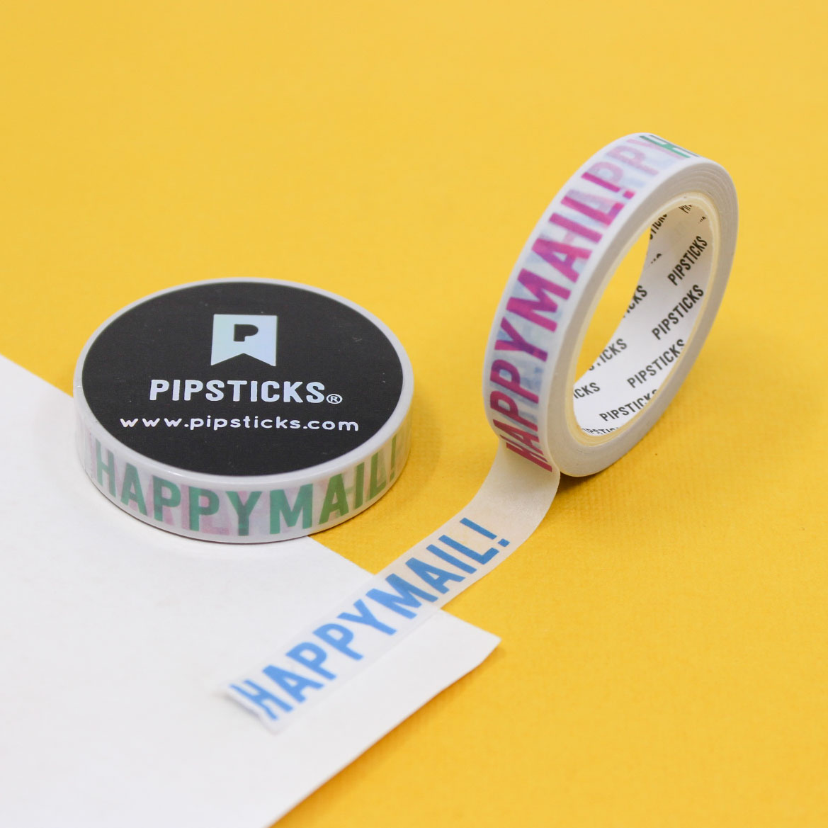 Narrow colorful washi tape with “Happy Mail” text and envelope icons