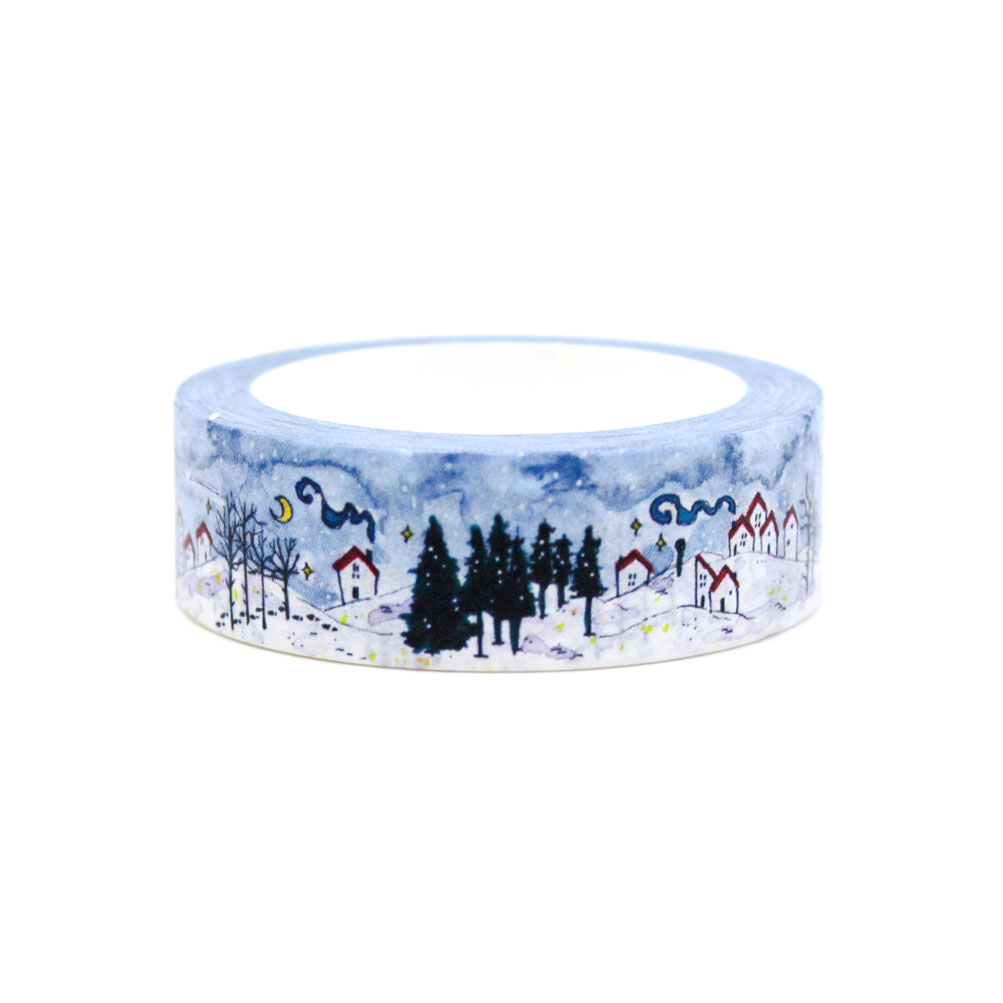 Cozy Christmas washi tape roll with houses, trees, and falling snow — perfect for planners and journaling.